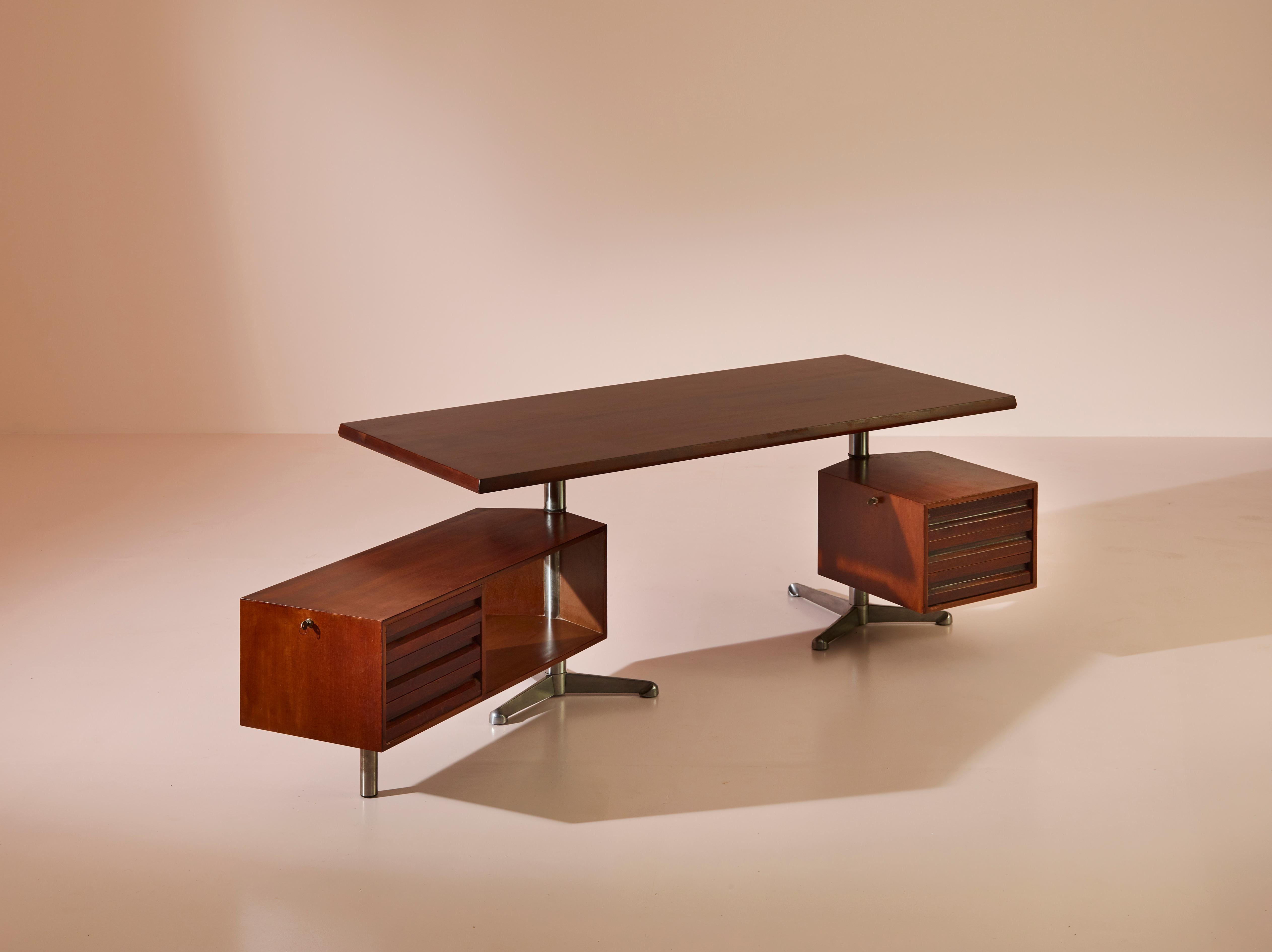 This T95 desk is a remarkable creation by the renowned designer Osvaldo Borsani for Tecno, Italy. Conceived in the 1956 and crafted towards the latter years of the same decade, this desk stands as a testament to the era's innovative and sleek
