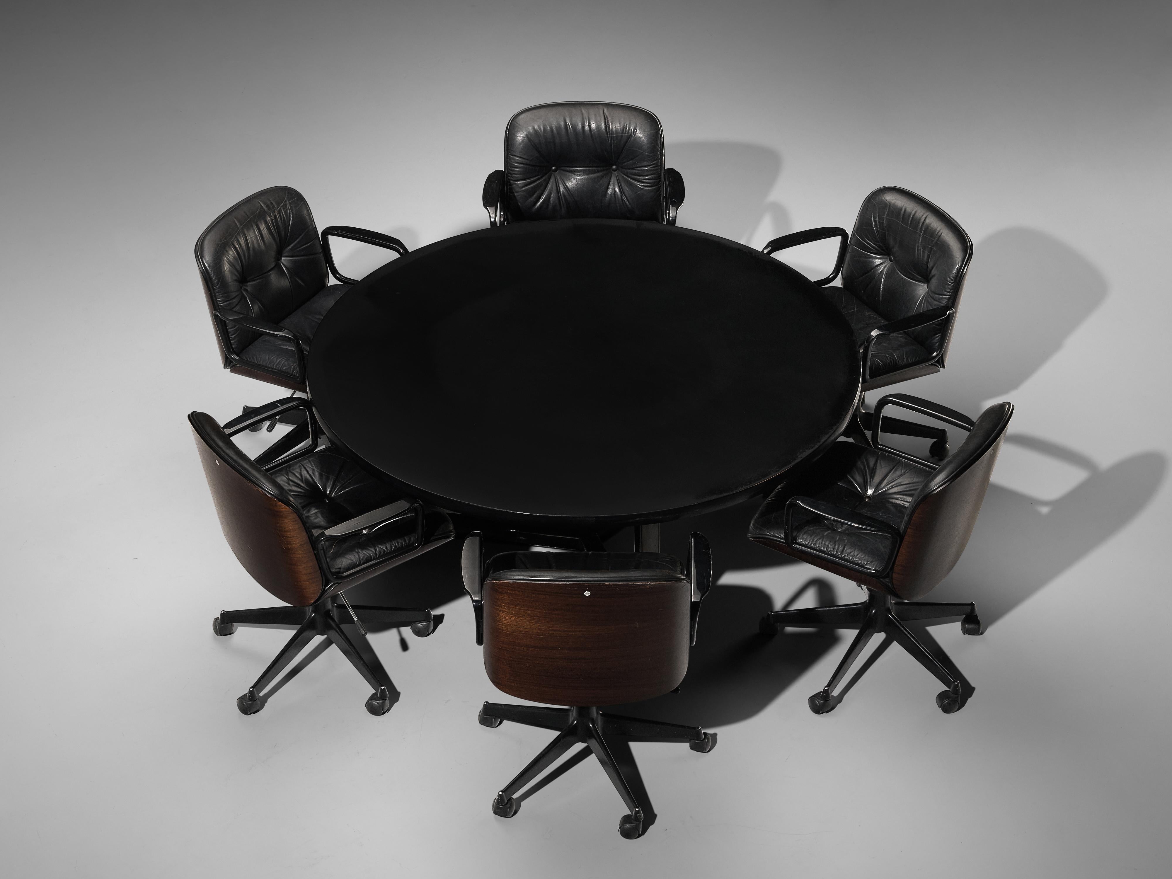 Osvaldo Borsani for Tecno, conference table T334-C, aluminum and wood, Italy, 1975-1978.

Round dining table with a round top. The base consists out of a three-legged metal frame which creates an open character. It was at the time that founder and