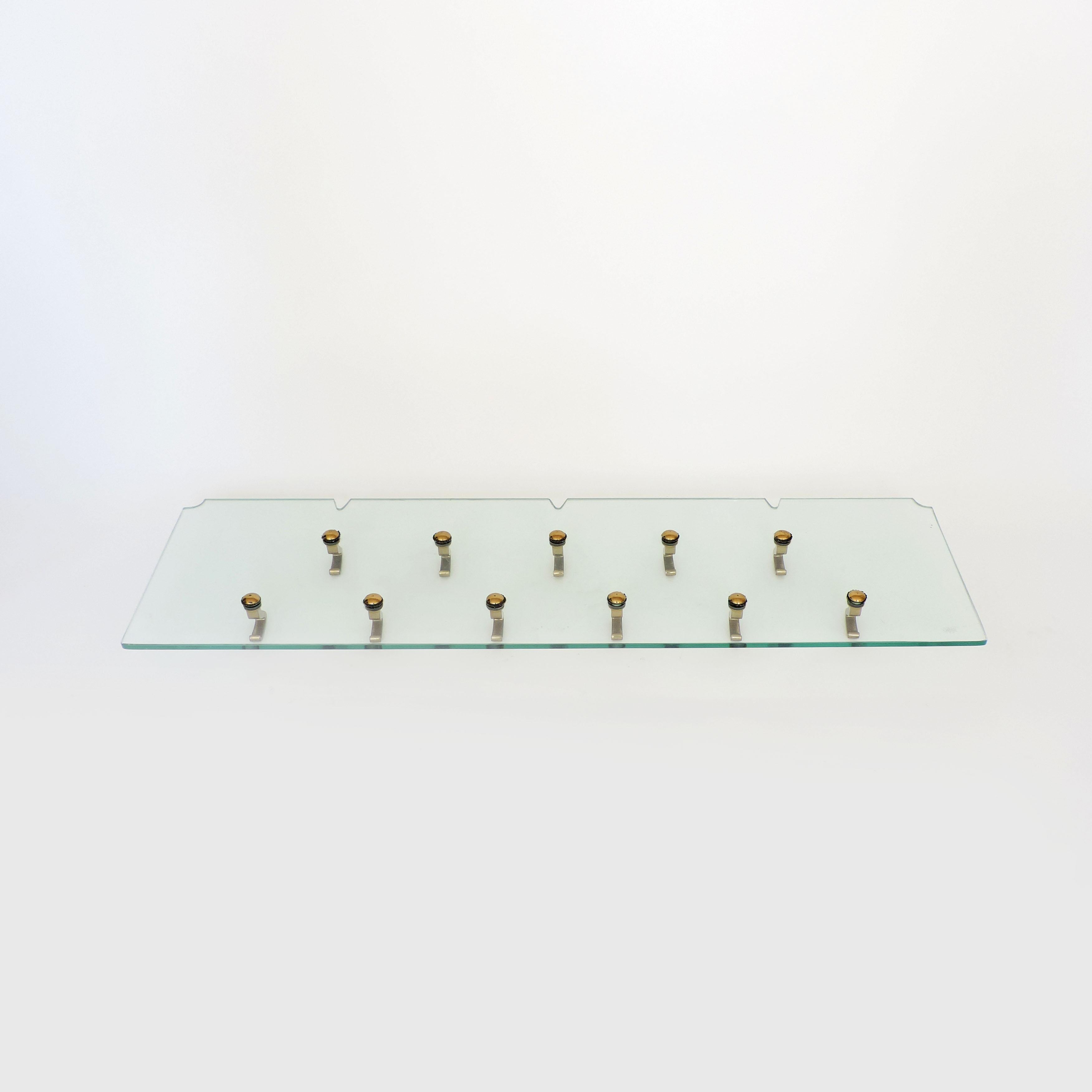 Osvaldo Borsani wall coat hanger in glass and brass, Italy, 1950s
Original VITREX glass 
The Coat Hanger needs to be Built In the wall.
 