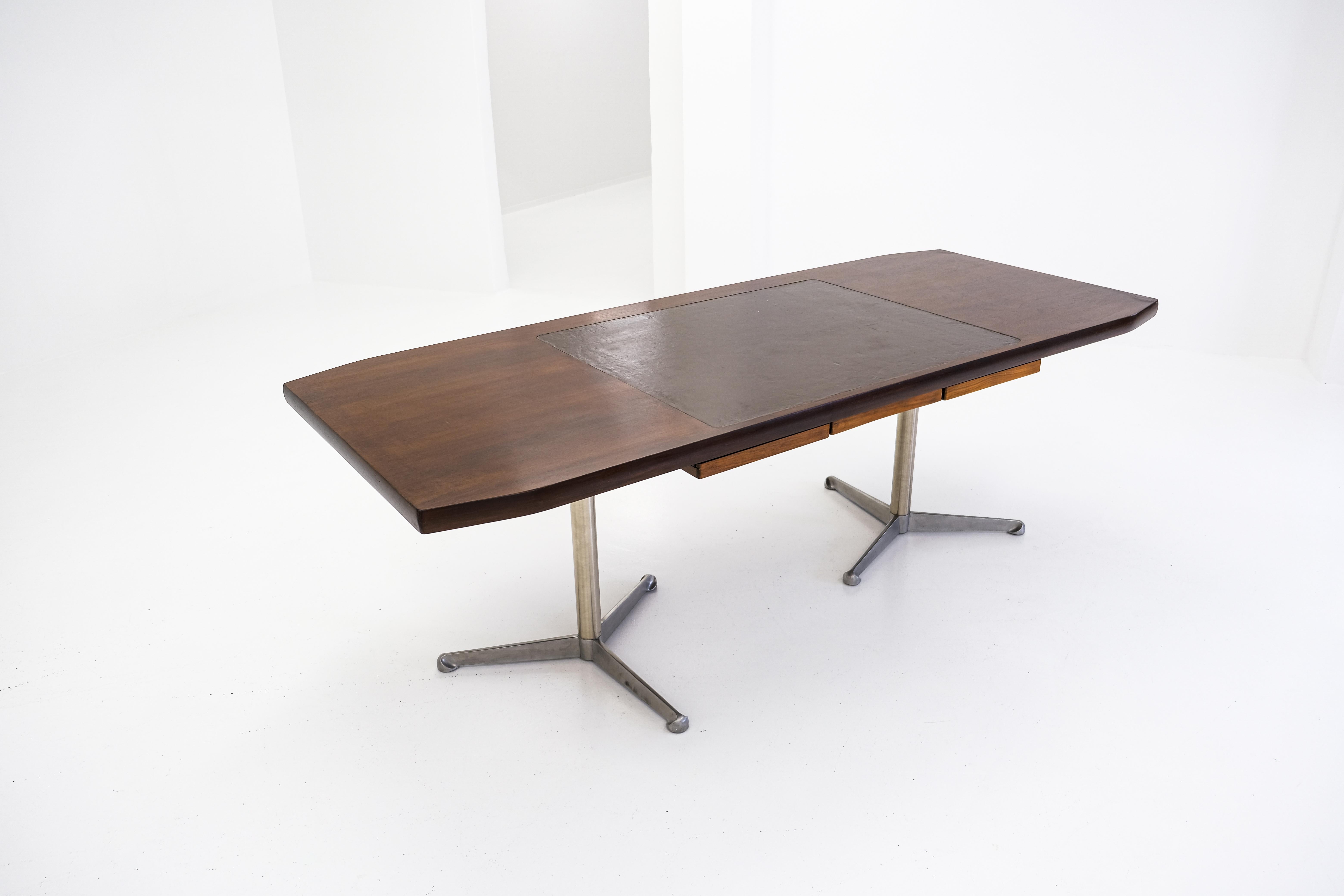 Stunning large desk or writing table designed by Osvaldo Borsani and manufactured by Tecno, Italy 1954. The table has aluminium tripod legs for stability and the top is made of walnut veneer with a brown leather inlay with a beautiful patina from