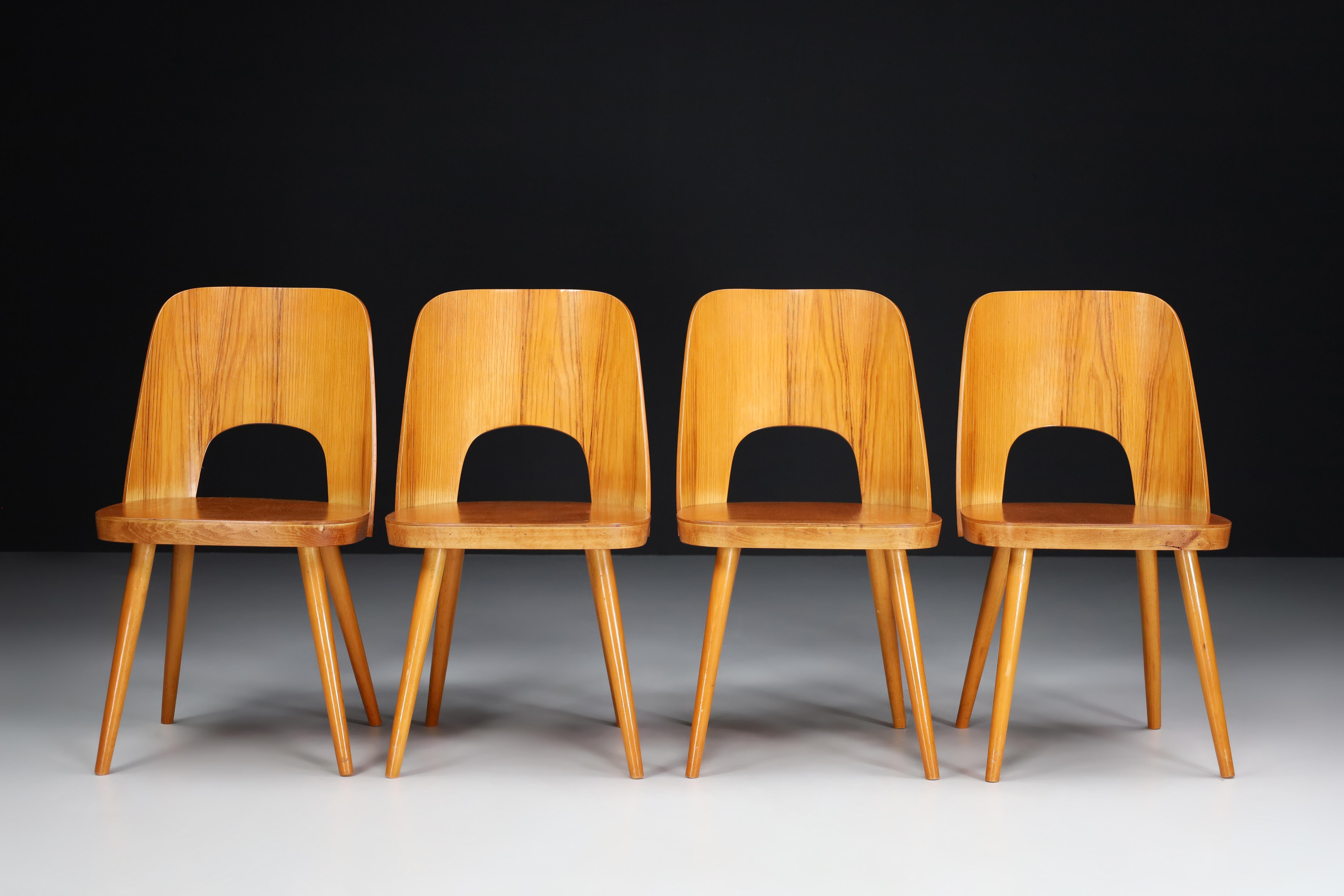 Oswald Haerdtl set of four chairs, the 1950s 

A rare set of four chairs was designed by the Austrian designer Oswald Haerdtl and produced by Ton (Thonet) in the former Czechoslovakia 1950s. Characteristic ash wood chairs, curved backrest, wooden