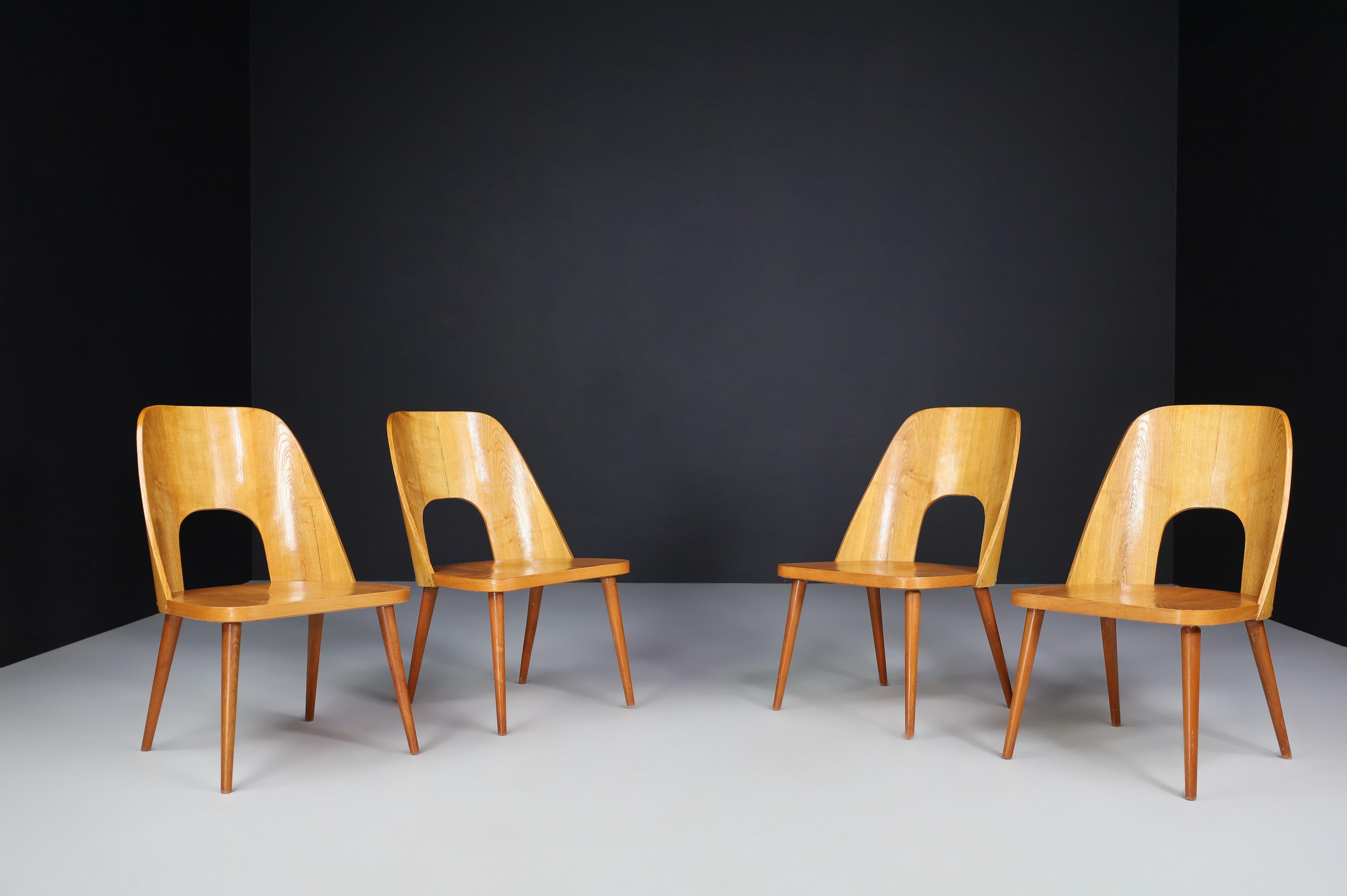 Oswald Haerdtl set of four easy chairs, the 1950s

A rare set of four easy chairs was designed by the Austrian designer Oswald Haerdtl and produced by Ton (Thonet) in the former Czechoslovakia 1950s. Characteristic ash wood chairs, curved
