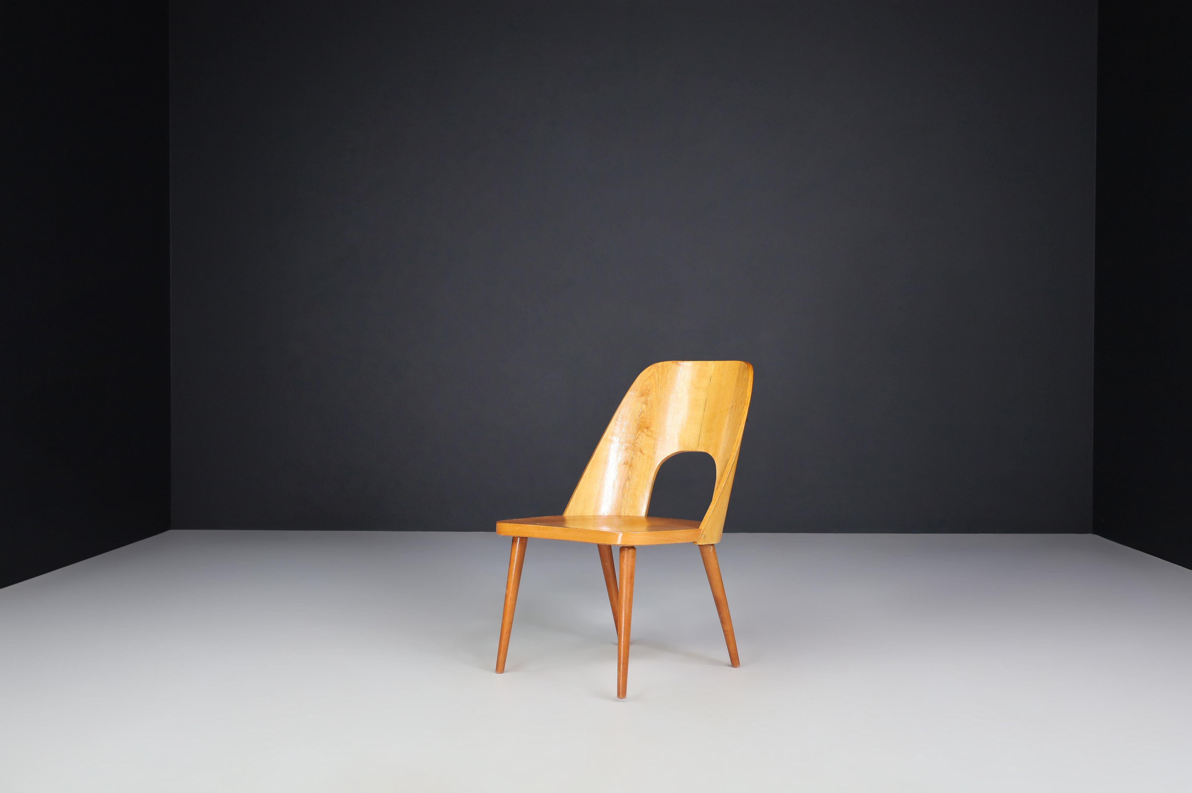 Tchèque Oswald Haerdtl - Ensemble de quatre chaises à bascule, années 1950 en vente