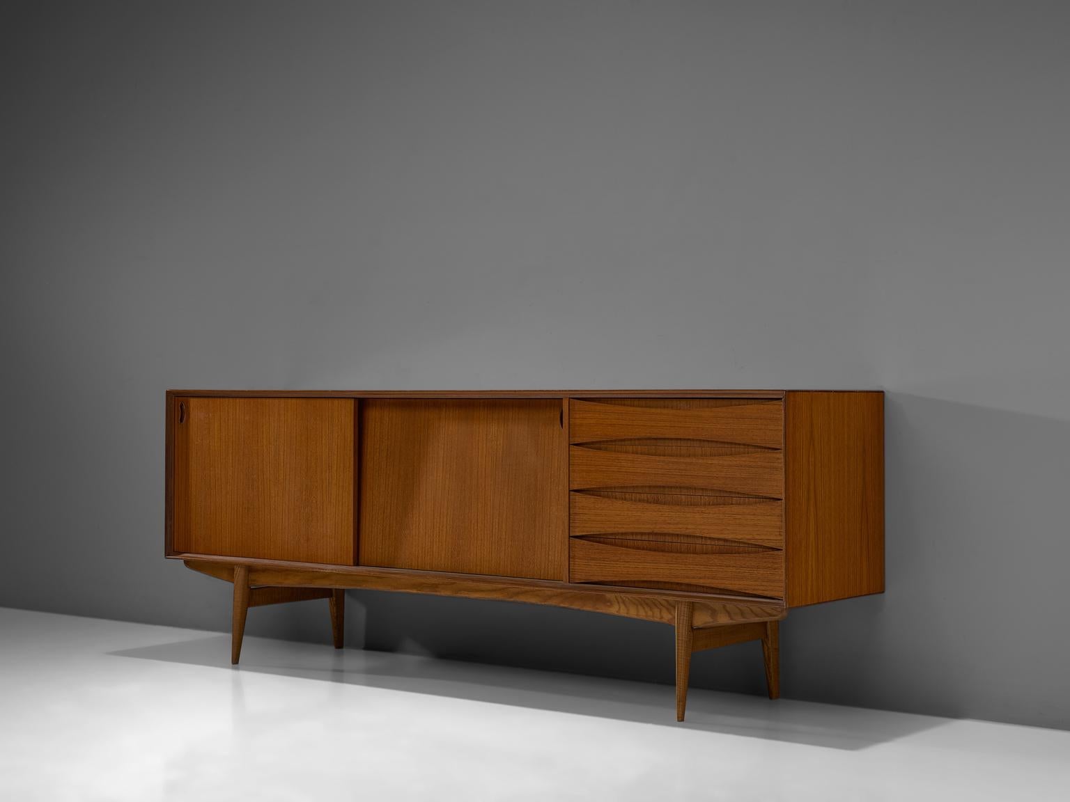 Oswald Vermaercke for V-Form, 'Paola' sideboard, teak, Belgium, 1959.

This iconic sideboard was manufactured in the year that the king of Belgium, Albert II, married the beautiful Italian Paola Ruffo di Calabria. Therefore, Vermaercke named it