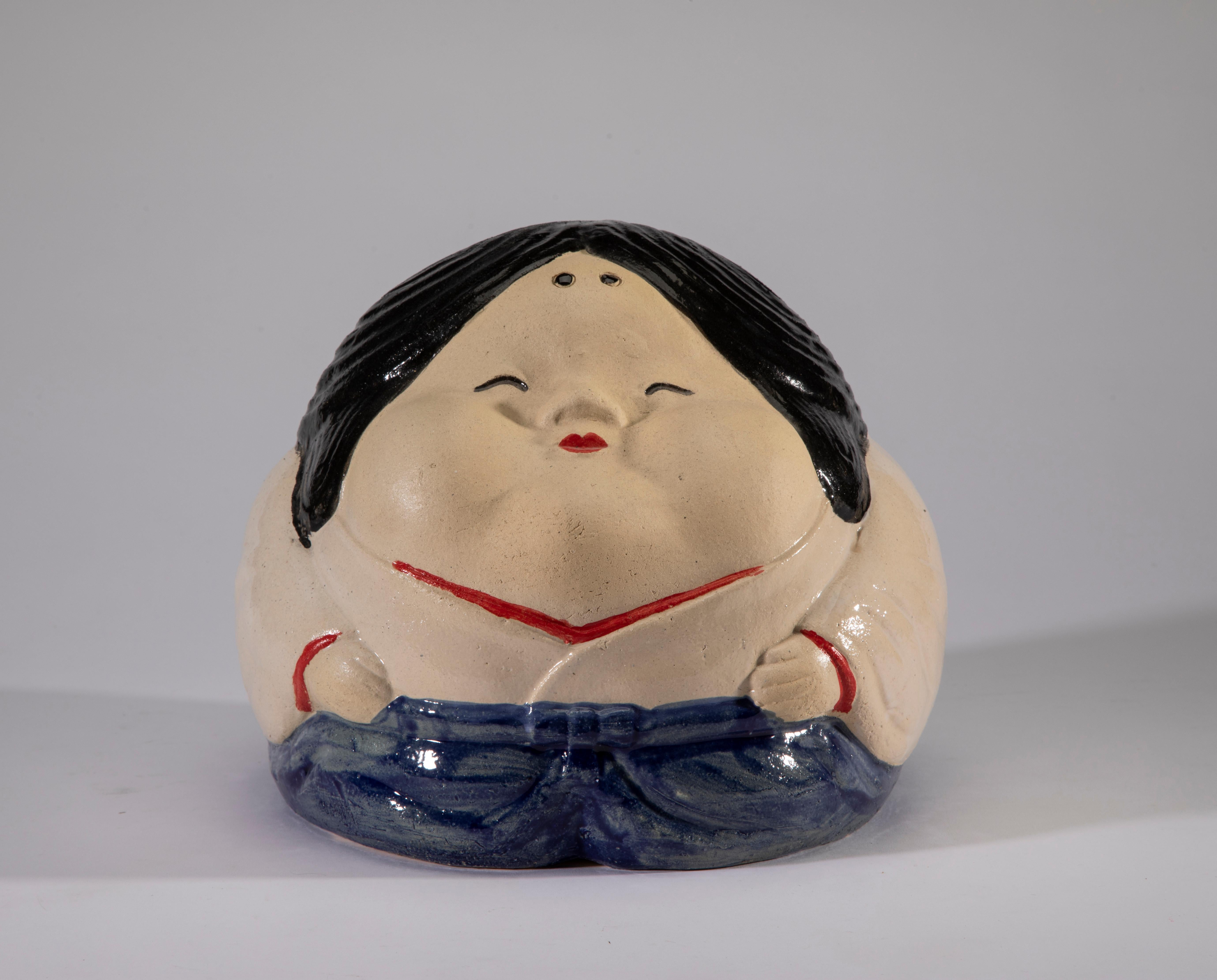 Otafuku - So, what is Not To Love About a Smile Like This ? ! 

Meet Otafuku ! She is known for her Generosity, Kindness, and Goodwill in Japan. 

She is a mythical figure who is much loved and her face is on many items.

Her smile will greet