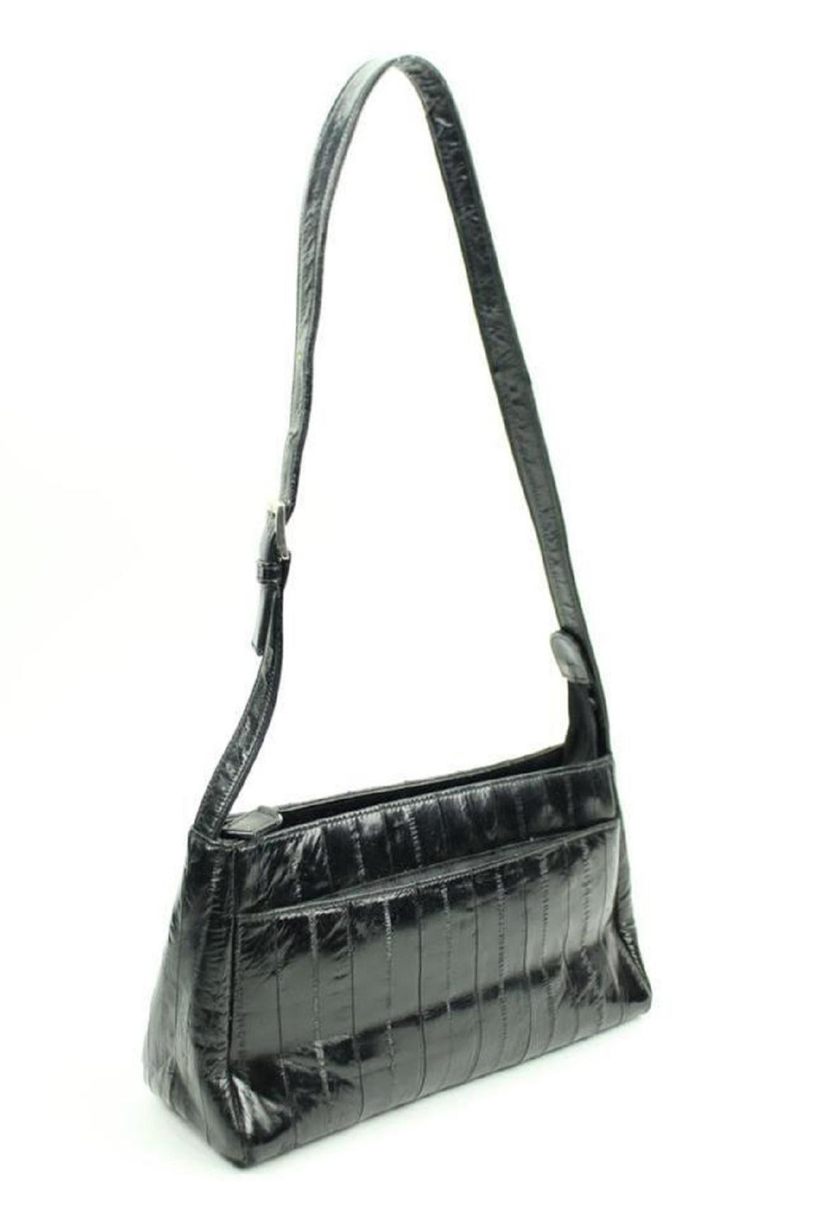 Measurements: Length: 11 Width: 3 Height:6
 Shoulder adjustable strap: 13 inches 
 
 GOOD CONDITION
 (7/10 or B)
 
 Zipper works well 
 Signs of Wear: Marks on exterior and interior. Scratches on exterior and interior. Scuff Marks on exterior.