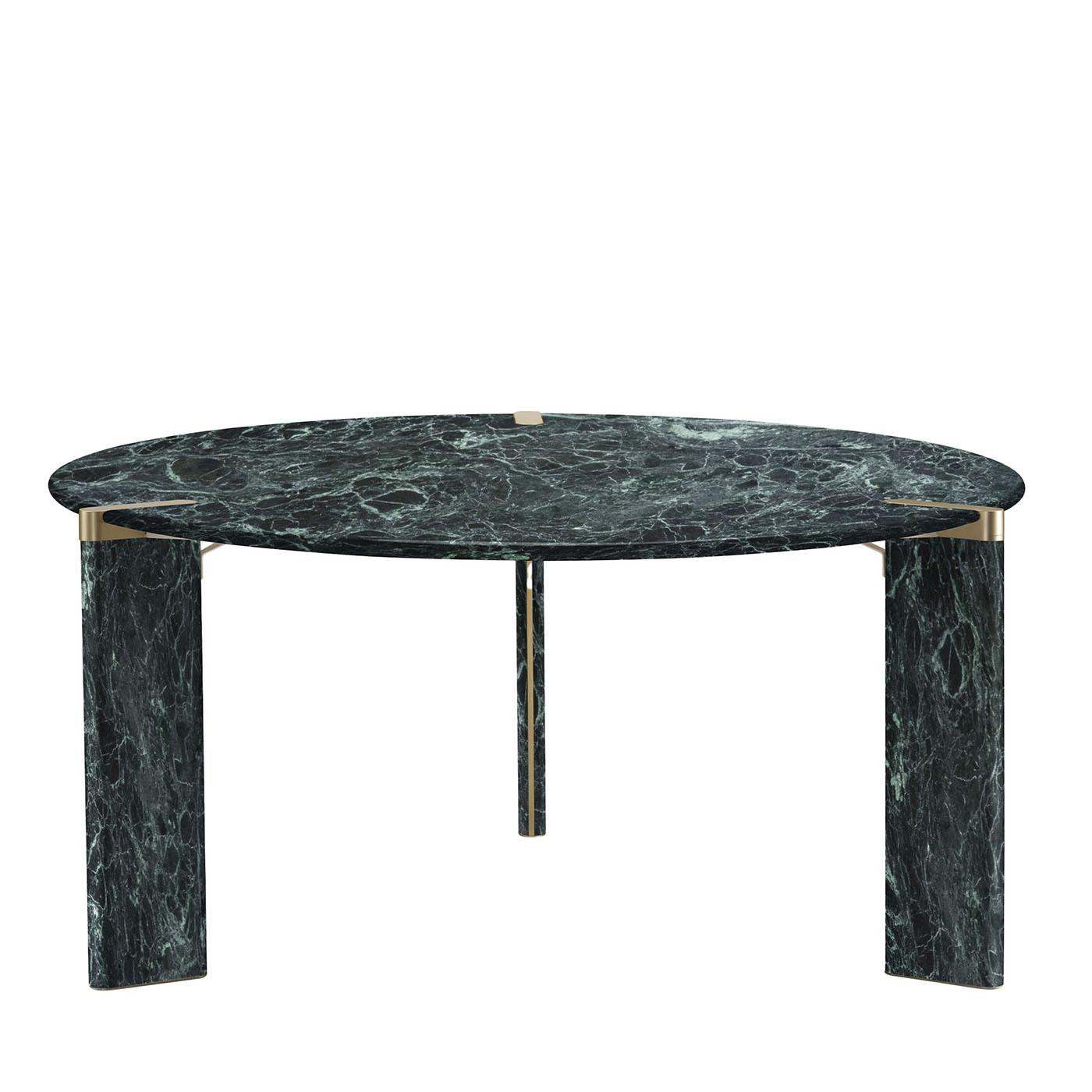 Clean geometric volumes fashioned of prized Verde Alpi marble lend this dining table its distinctive, luxurious impact. Aluminum inserts add accents of brightness to the structure, which never fails to seduce with the intricate, unpredictable