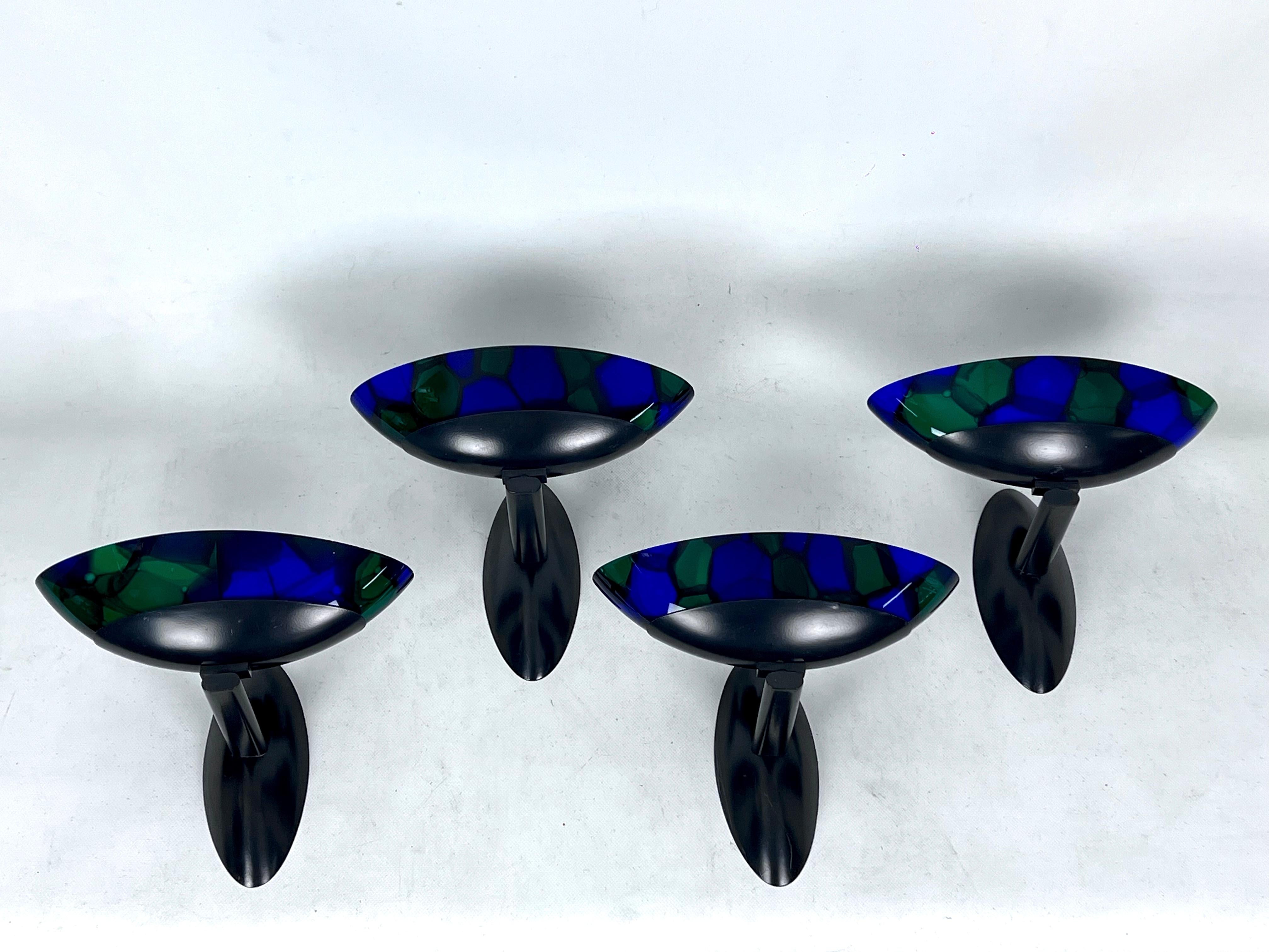 Rare set of four exclusive sconces made from thick murano glass and metal. Engraved signature on the glass by Missoni. No chips or cracks. Italy 1980s. Full working with EU standard, adaptable on demand for USA standard.