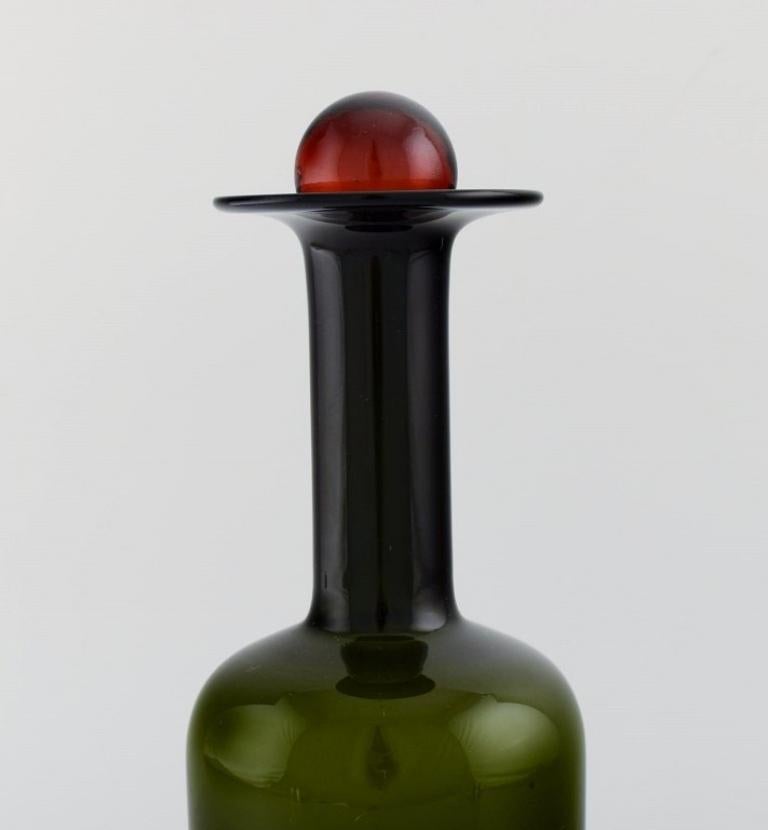 Scandinavian Modern Otto Brauer for Holmegaard. Bottle in green art glass with red ball, 1960s