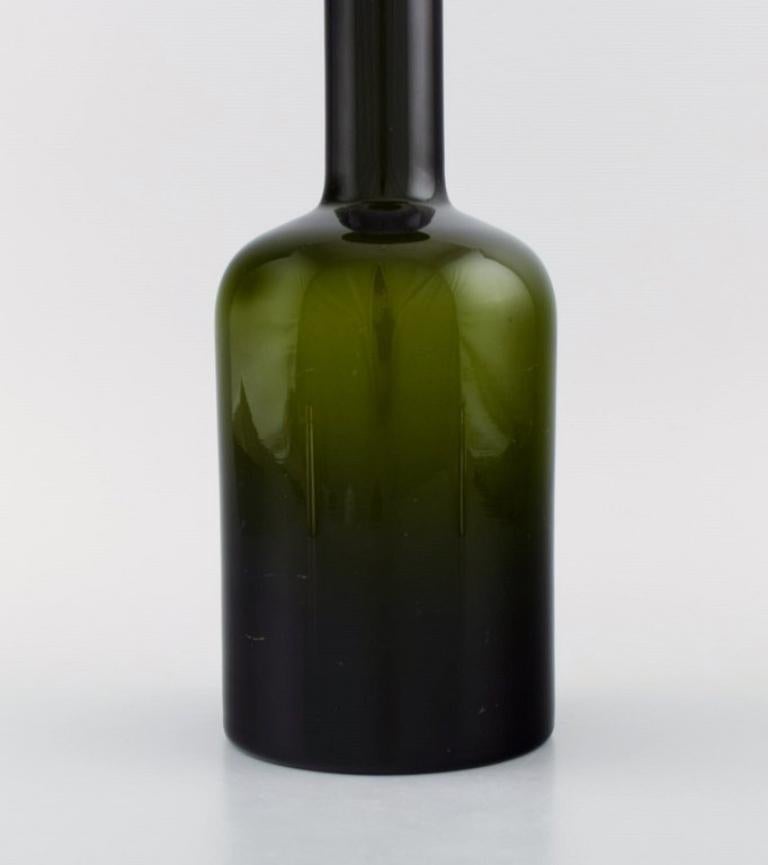 Danish Otto Brauer for Holmegaard. Bottle in green art glass with red ball, 1960s
