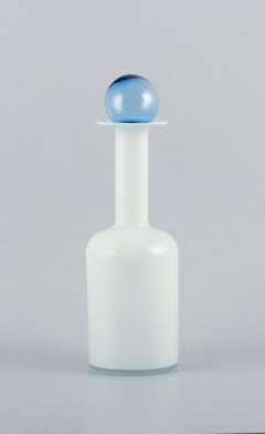 Otto Brauer for Holmegaard. Bottle in white art glass with a light blue ball.