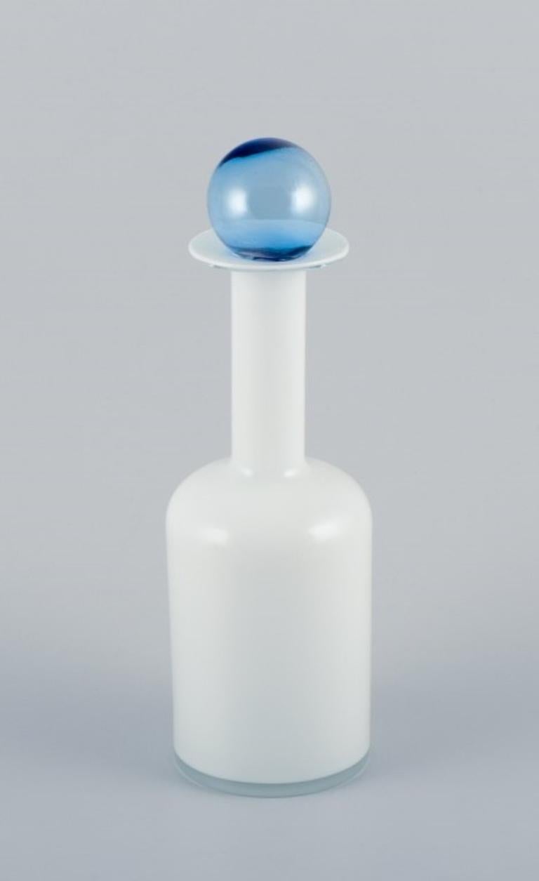Scandinavian Modern Otto Brauer for Holmegaard. Bottle in white art glass with a light blue ball. For Sale