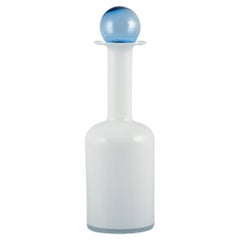 Retro Otto Brauer for Holmegaard. Bottle in white art glass with a light blue ball.