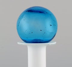 Otto Brauer for Holmegaard. Bottle in white art glass with light blue ball