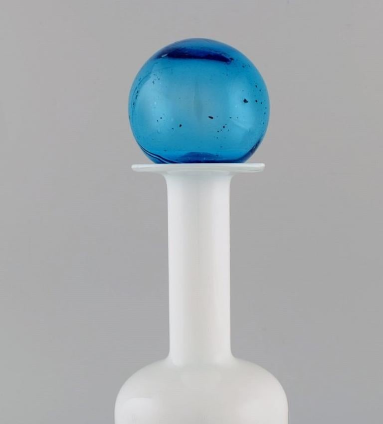 Scandinavian Modern Otto Brauer for Holmegaard. Bottle in white art glass with light blue ball For Sale