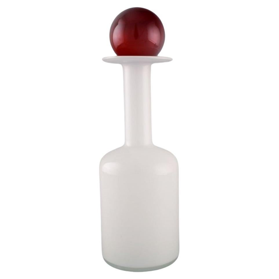 Otto Brauer for Holmegaard. Bottle in white art glass with red ball. 1960s For Sale