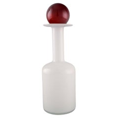 Otto Brauer for Holmegaard. Bottle in white art glass with red ball. 1960s