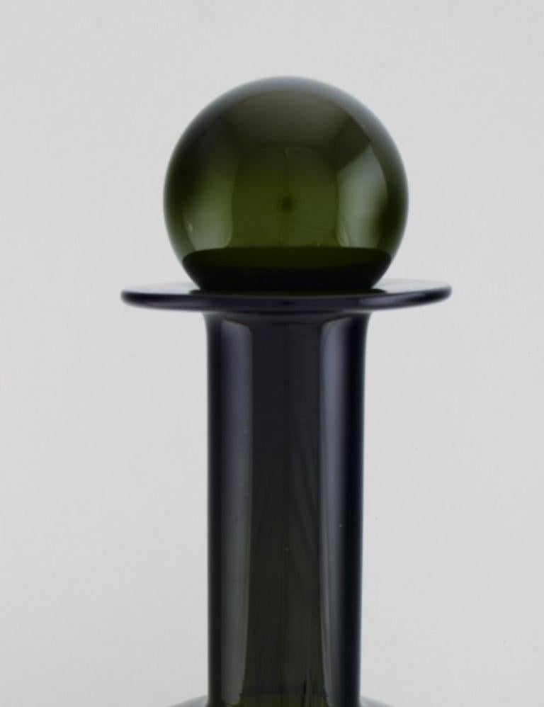 Scandinavian Modern Otto Brauer for Holmegaard.  Colossal bottle in green art glass with green ball For Sale