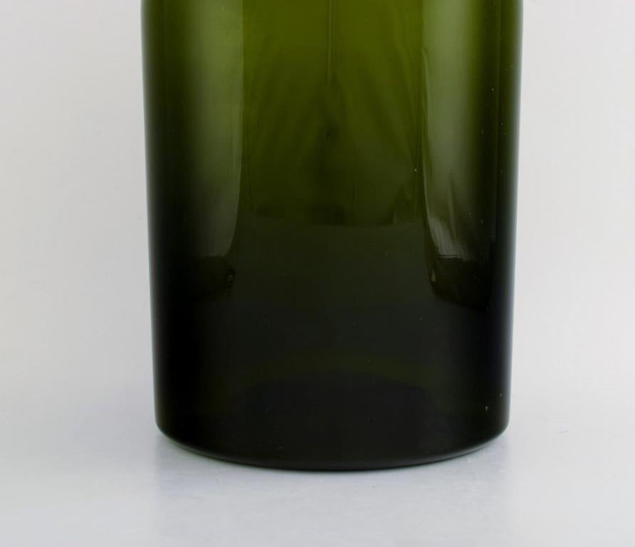 Danish Otto Brauer for Holmegaard.  Colossal bottle in green art glass with green ball For Sale