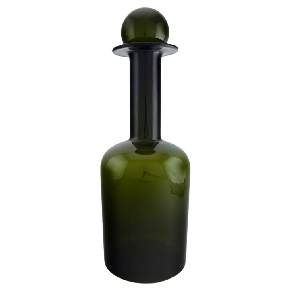 Otto Brauer for Holmegaard.  Colossal bottle in green art glass with green ball For Sale
