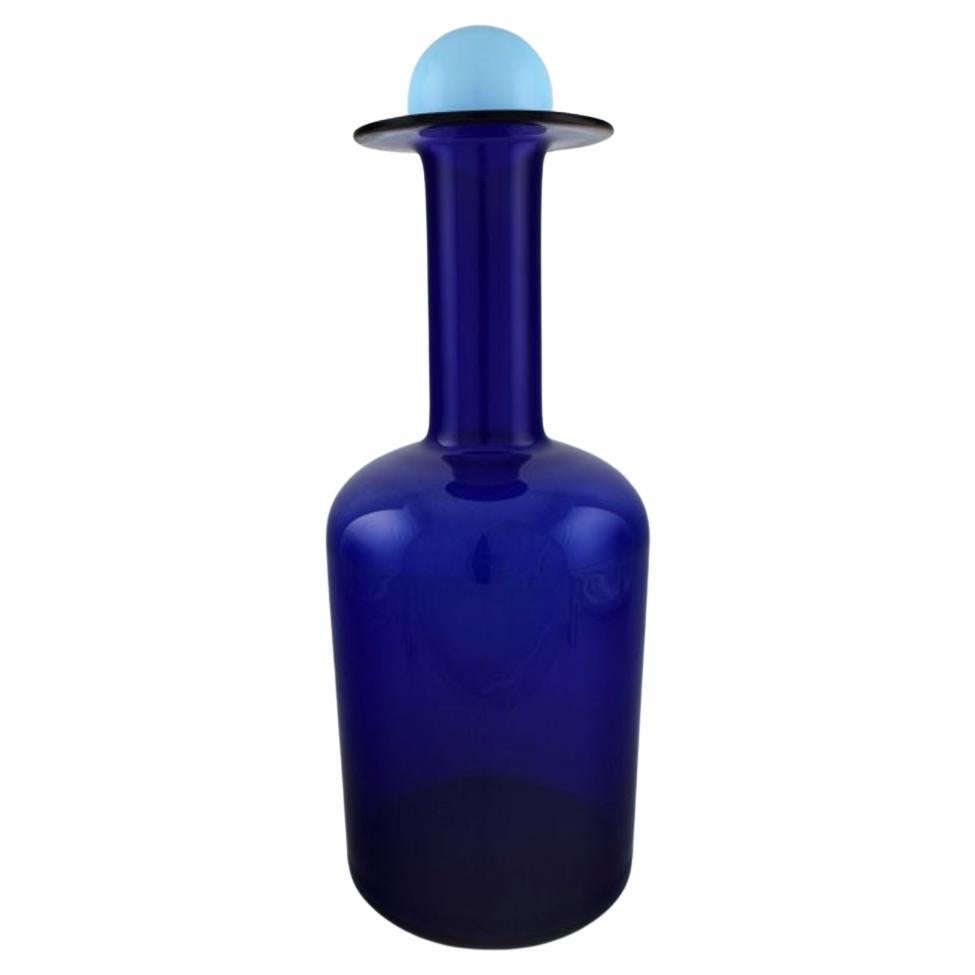 Otto Brauer for Holmegaard. Large bottle in blue art glass with light blue ball. For Sale