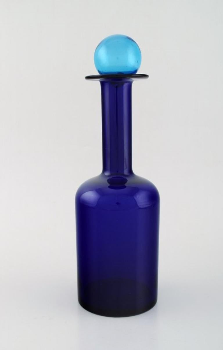 Otto Brauer for Holmegaard. Large bottle in blue glass with blue ball For Sale