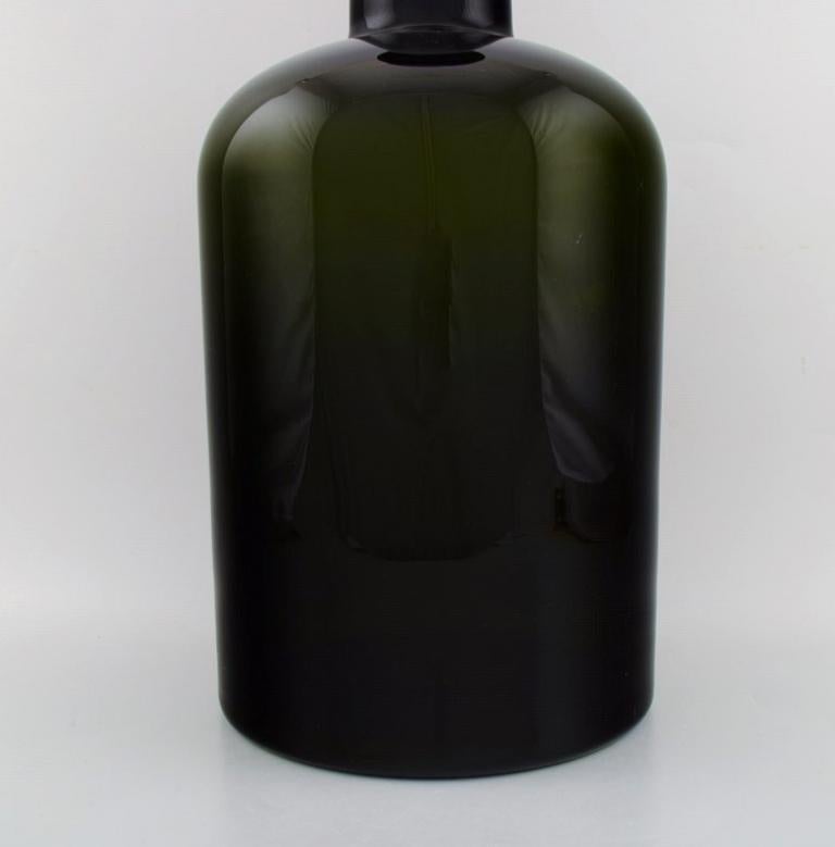 Scandinavian Modern Otto Brauer for Holmegaard.  Large bottle in dark blue and green art glass For Sale