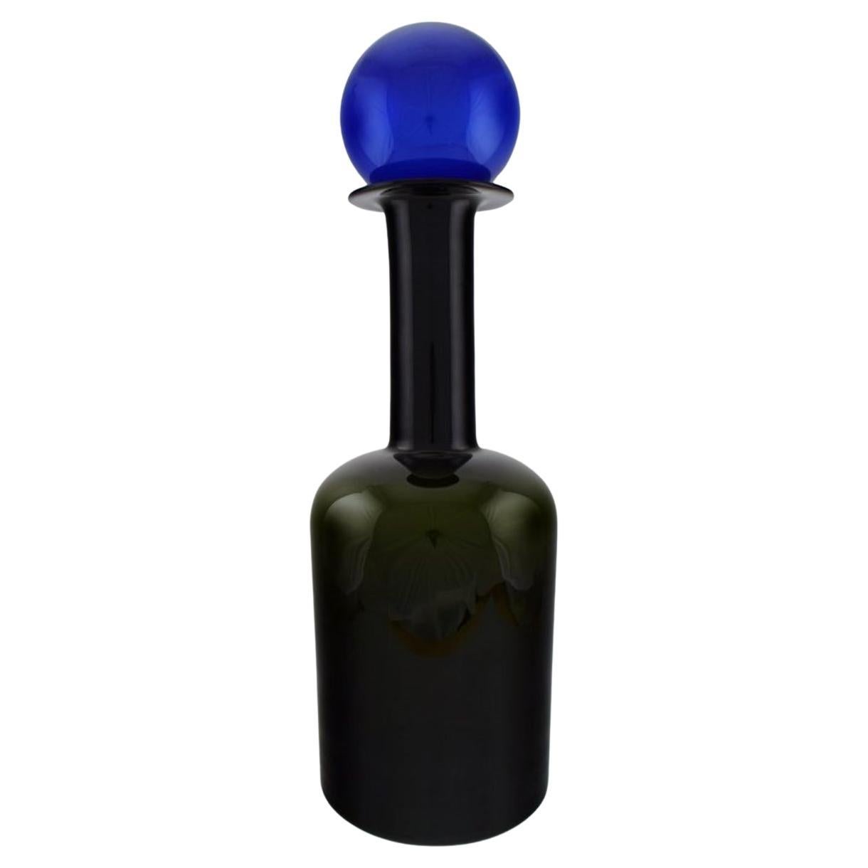 Otto Brauer for Holmegaard.  Large bottle in dark blue and green art glass For Sale