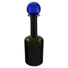 Otto Brauer for Holmegaard.  Large bottle in dark blue and green art glass