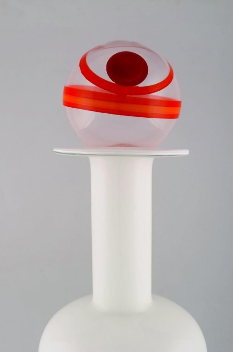Otto Brauer for Holmegaard. 
Large vase / bottle in white art glass with ball, 1960s.
Measures: 52.5 x 17 cm.
In perfect condition.