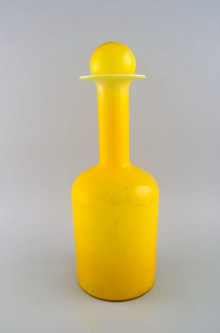 Otto Brauer for Holmegaard. Large vase/bottle in yellow art glass with a yellow ball. 1960s.
Measures: 42.5 x 15 cm (incl. Ball).
In excellent condition.
Label.