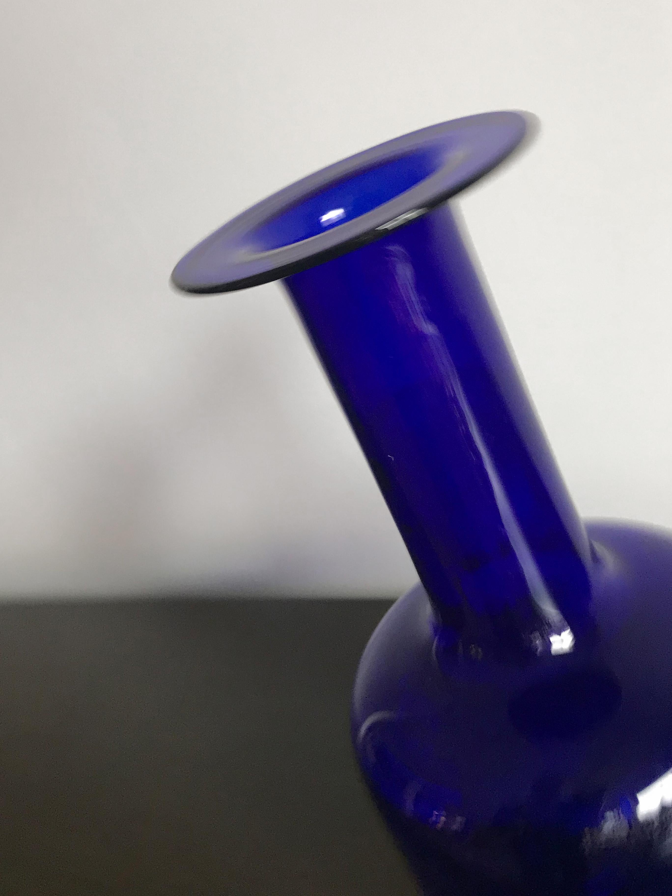 blue glass bottle vase
