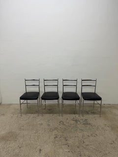 Chaises de salle à manger Otto Gerdau en Naugahyde chromé et noir, vers les années 1960 – Lot de quatre