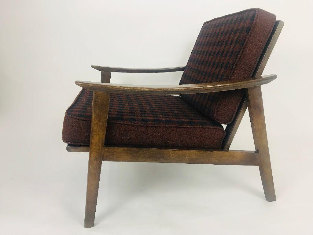 Pair of Mid-Century Modern lounge chairs by Otto Gerdau with the original cushions with tags attached. Chairs are dark walnut and in great condition. The cushions are amazing with the Gerdu tags intact. Someone must have taken the 