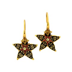 Otto Jakob "Stapelia" Boucles d'oreilles en or ornées de fleurs en émeraude rubis et émail