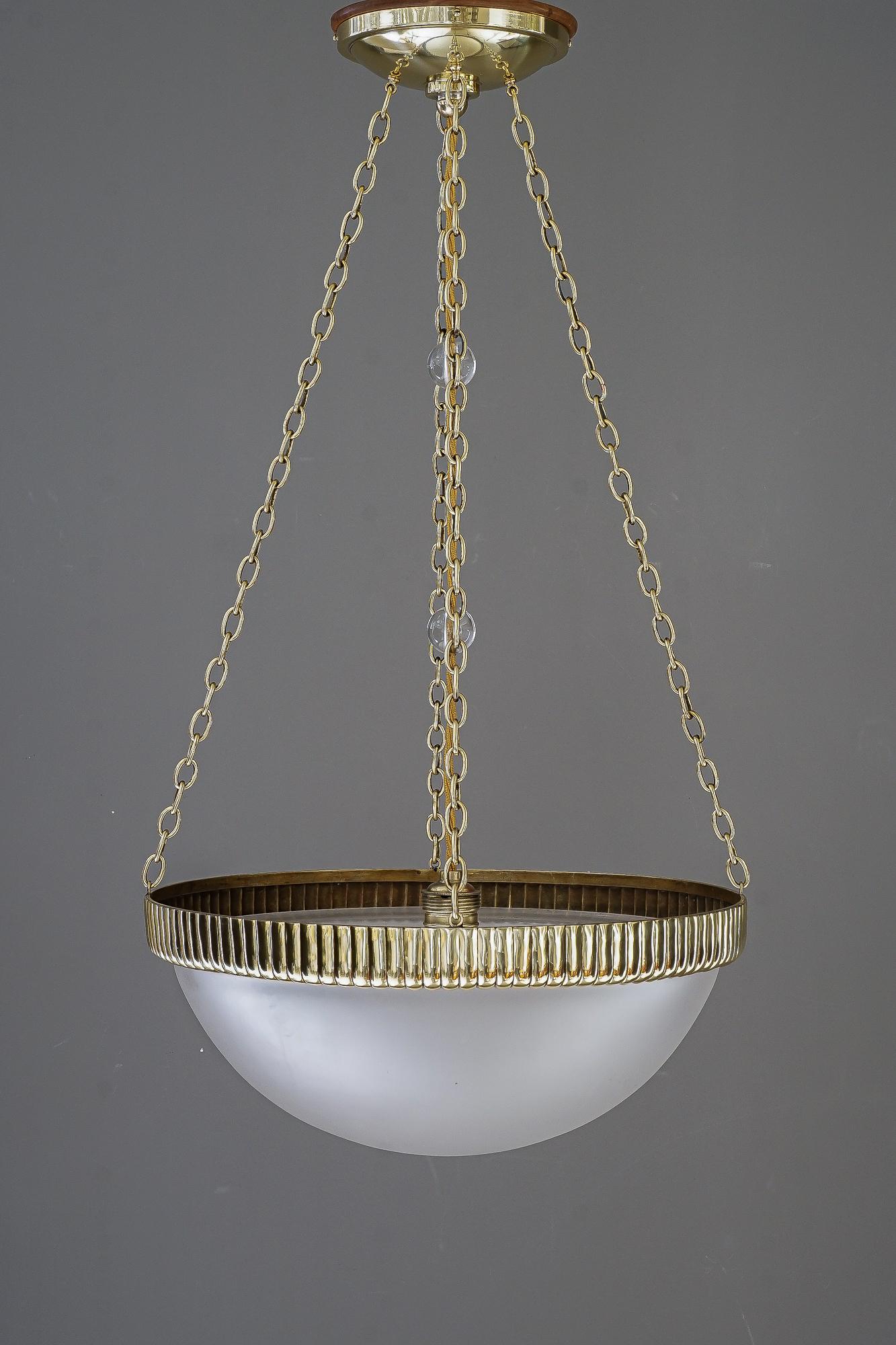 Otto Prutscher chandelier with original glass shade vienna around 1908
Brass polished and stove enameled
Original glass shade