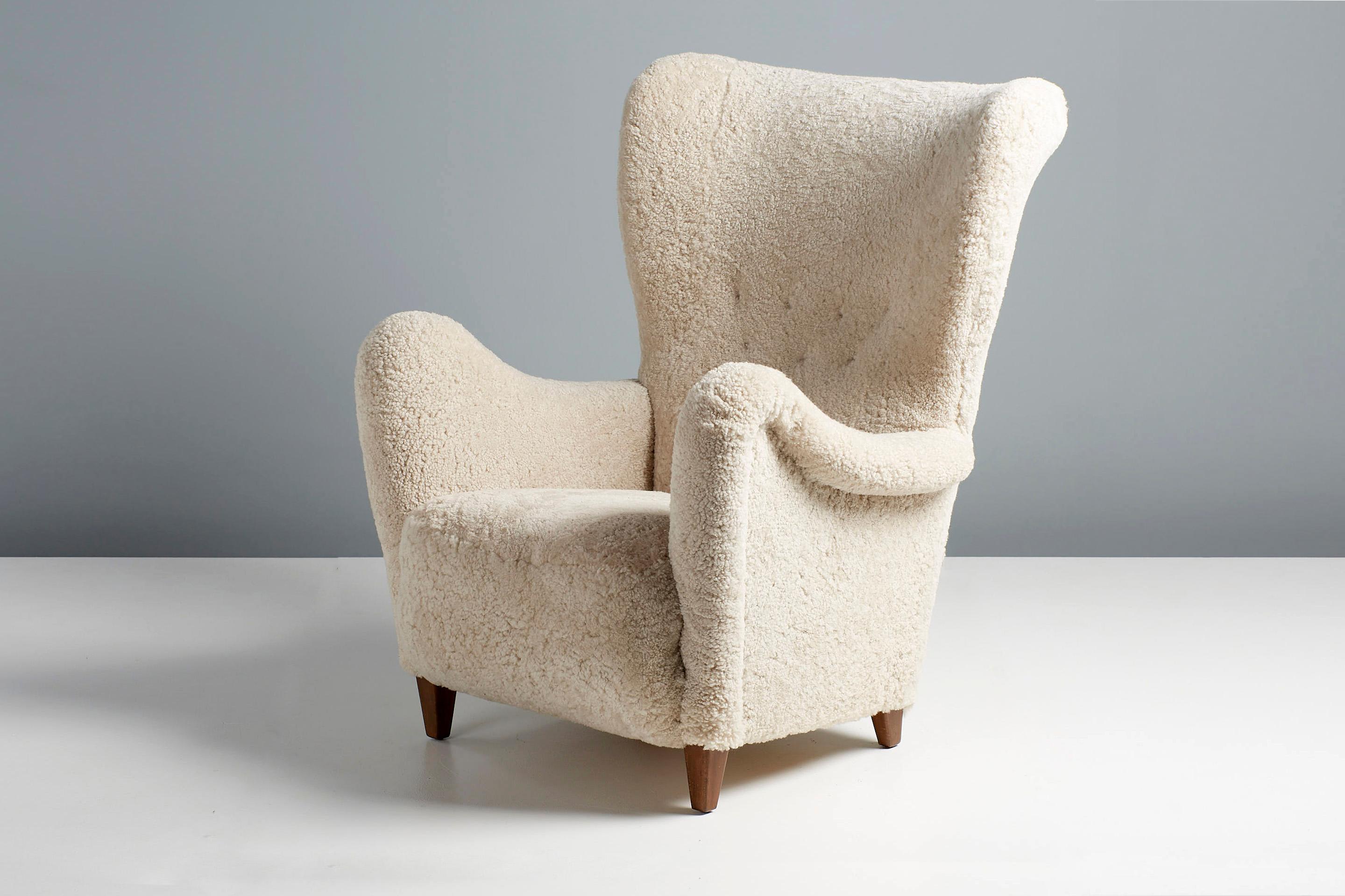Otto Schulz 1940s Sheepskin Swedish Wing Chair In Good Condition For Sale In London, England