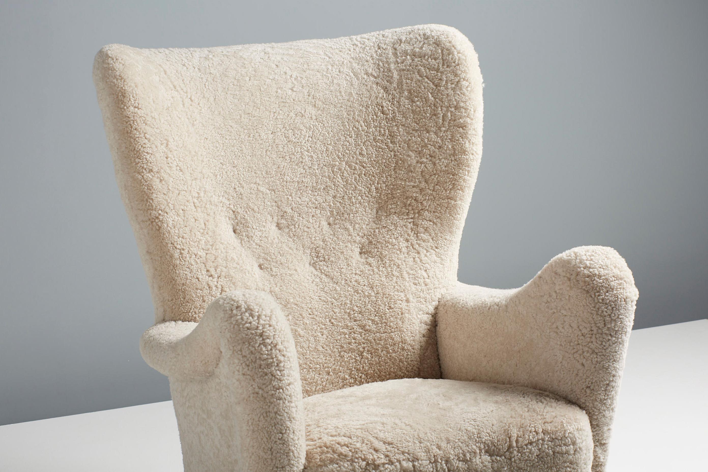 Mid-20th Century Otto Schulz 1940s Sheepskin Swedish Wing Chair For Sale