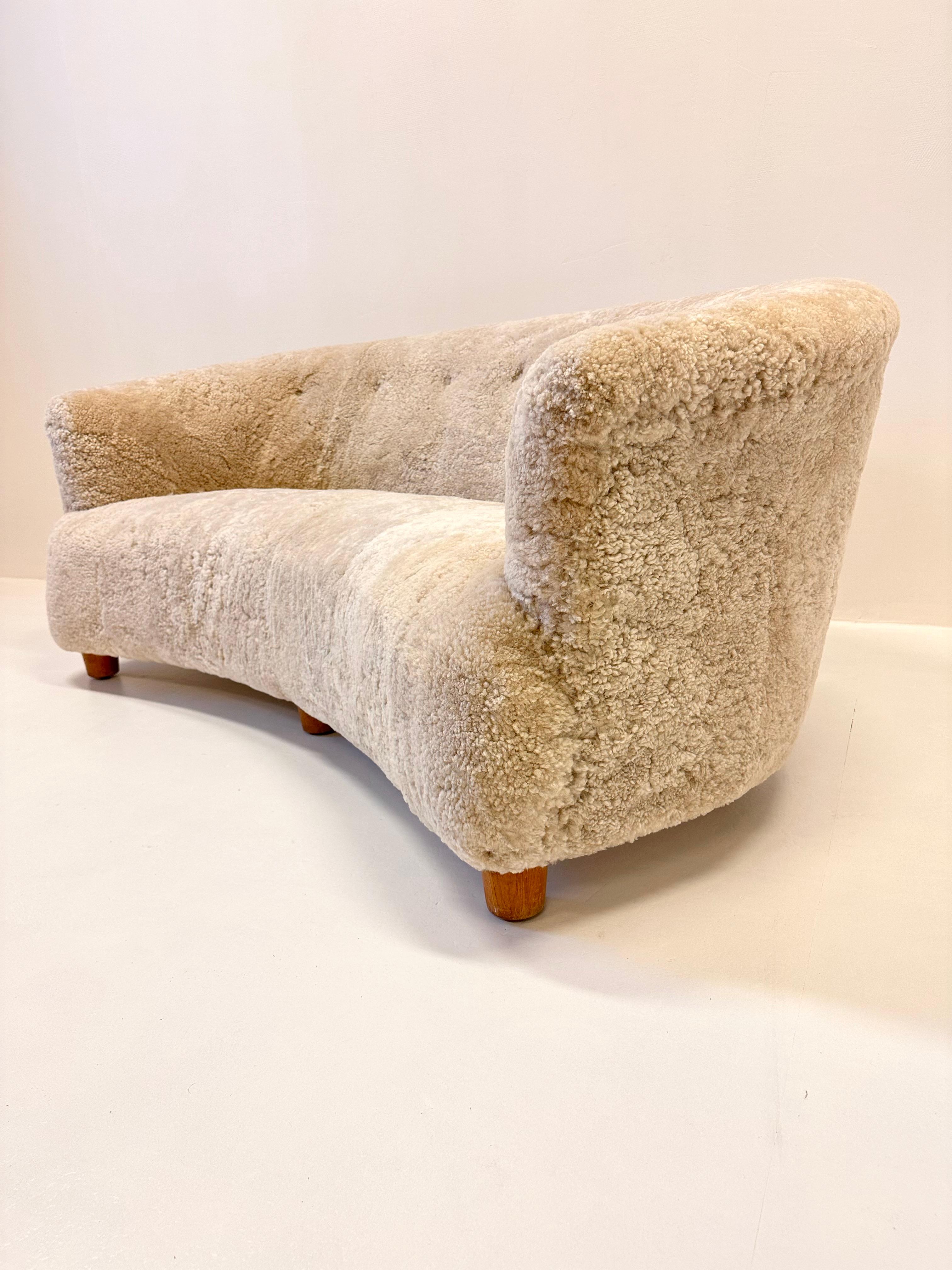 Amazing mid-century design Sheepskin Sofa, attributed to Otto Schulz. 

Big proportions and newly reupholstered and renovated. 

Fast shipping with white glove packaging. 
