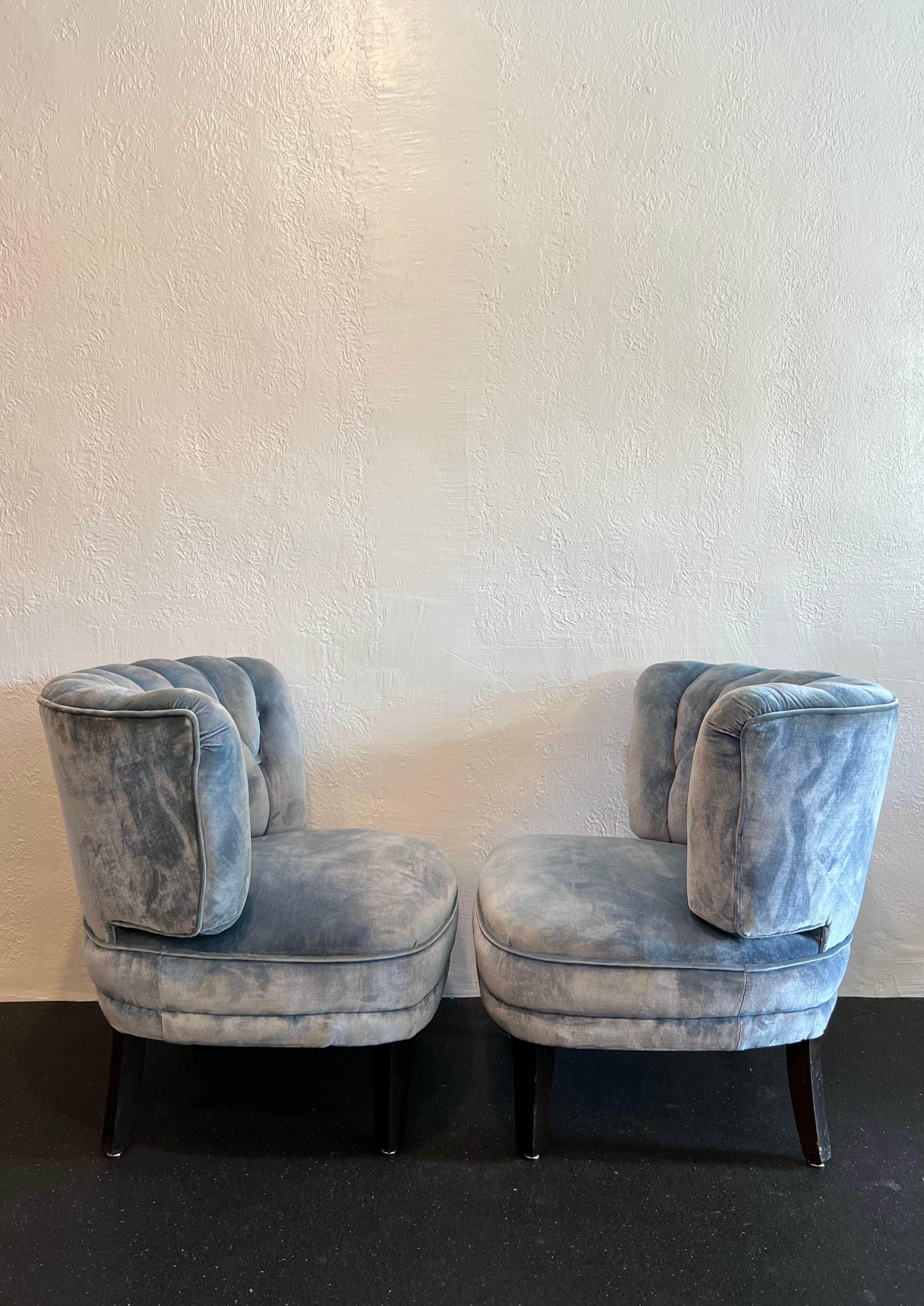 Pair of Otto Schulz tufted easy chairs. The velvet upholstery has been professionally cleaned and is found in good condition, no rips or tears. Legs show signs of wear (please refer to photos). 

Would work well in a variety of interiors such as