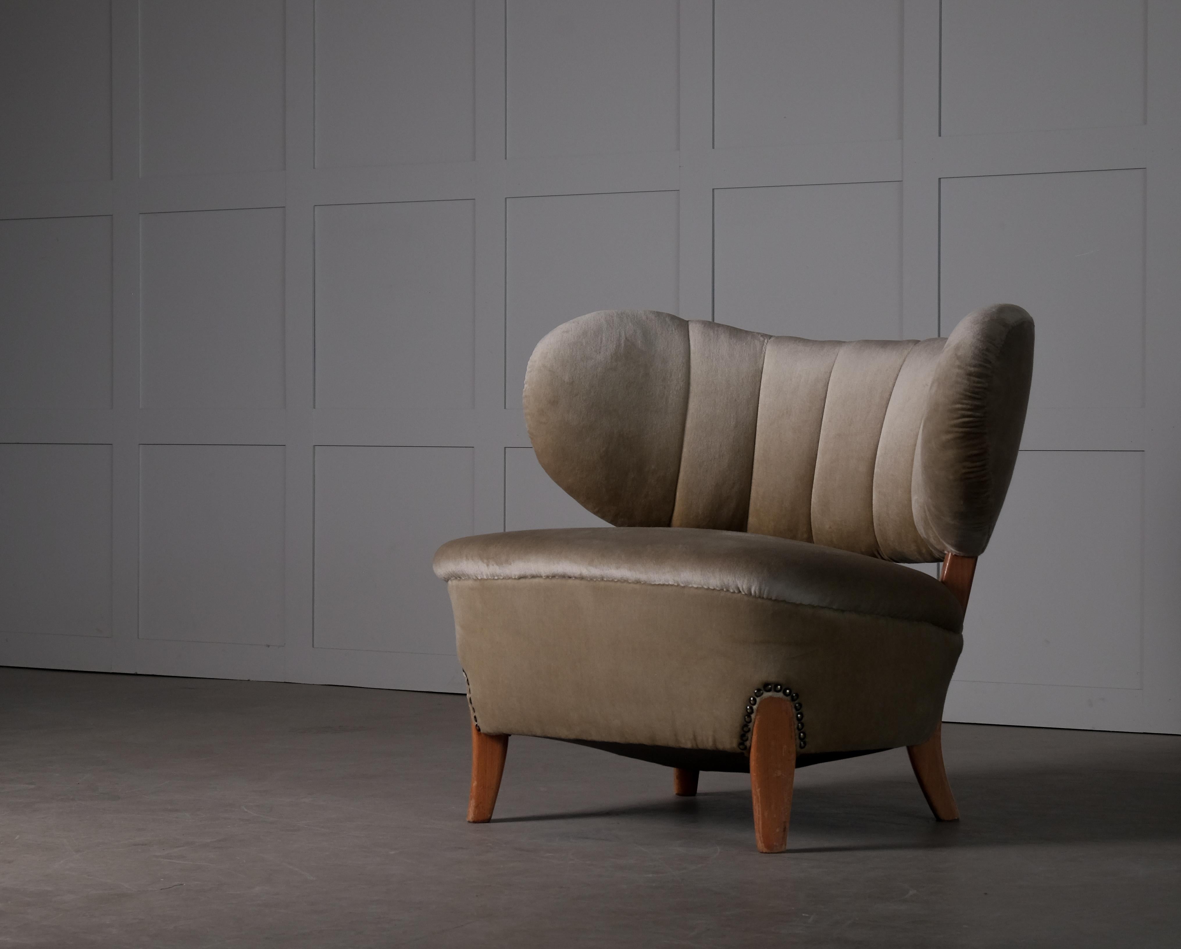 Samt-Sessel, entworfen von Otto Schulz, hergestellt von Boet, Schweden, 1940er Jahre.
 