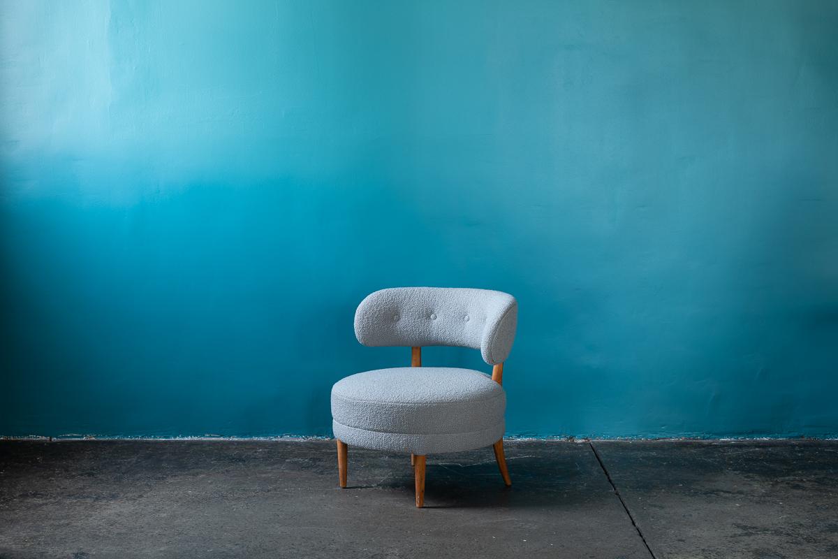 Otto Schulz Grey wool chair, reupholstered 

Otto Schulz was a furniture designer, interior designer, editor, and owner of the renowned furniture and interior decoration firm BOET, which he started in Gothenburg in 1920s and ran for 30 years. BOET