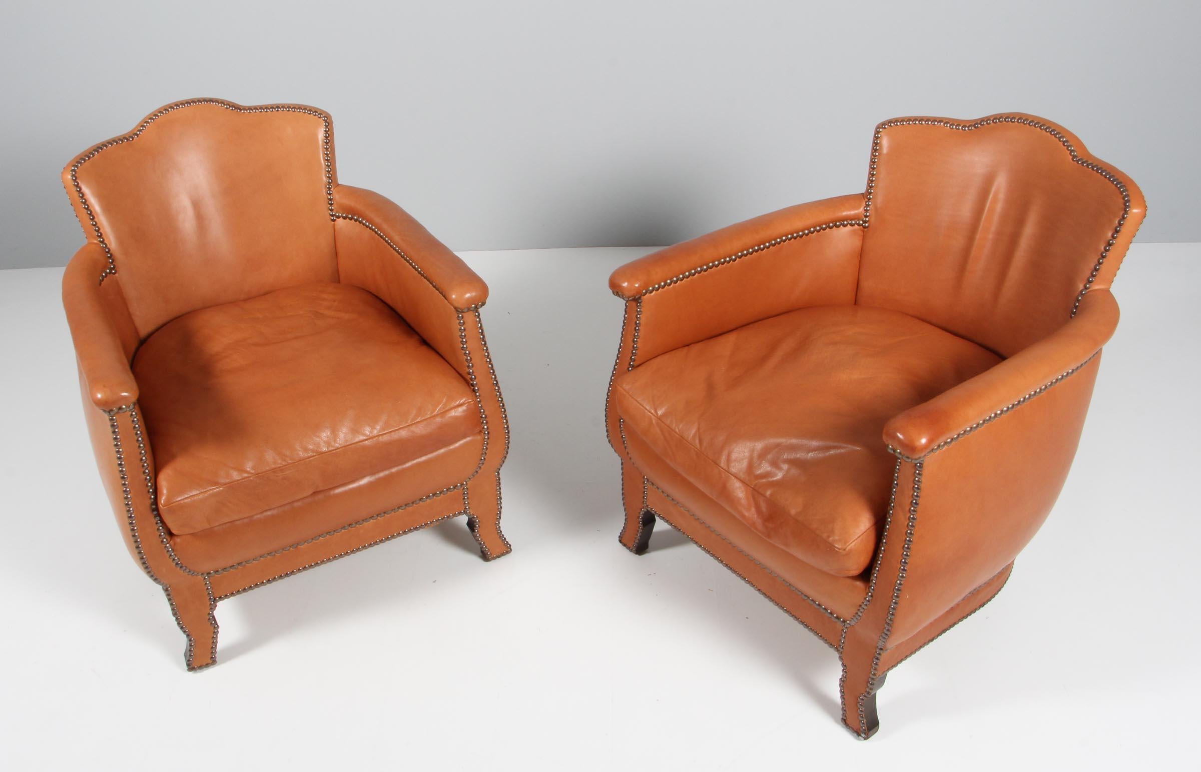 Otto Schulz pair of lounge chairs with original patinated leather.

Made by Boet, in the 1940s.

