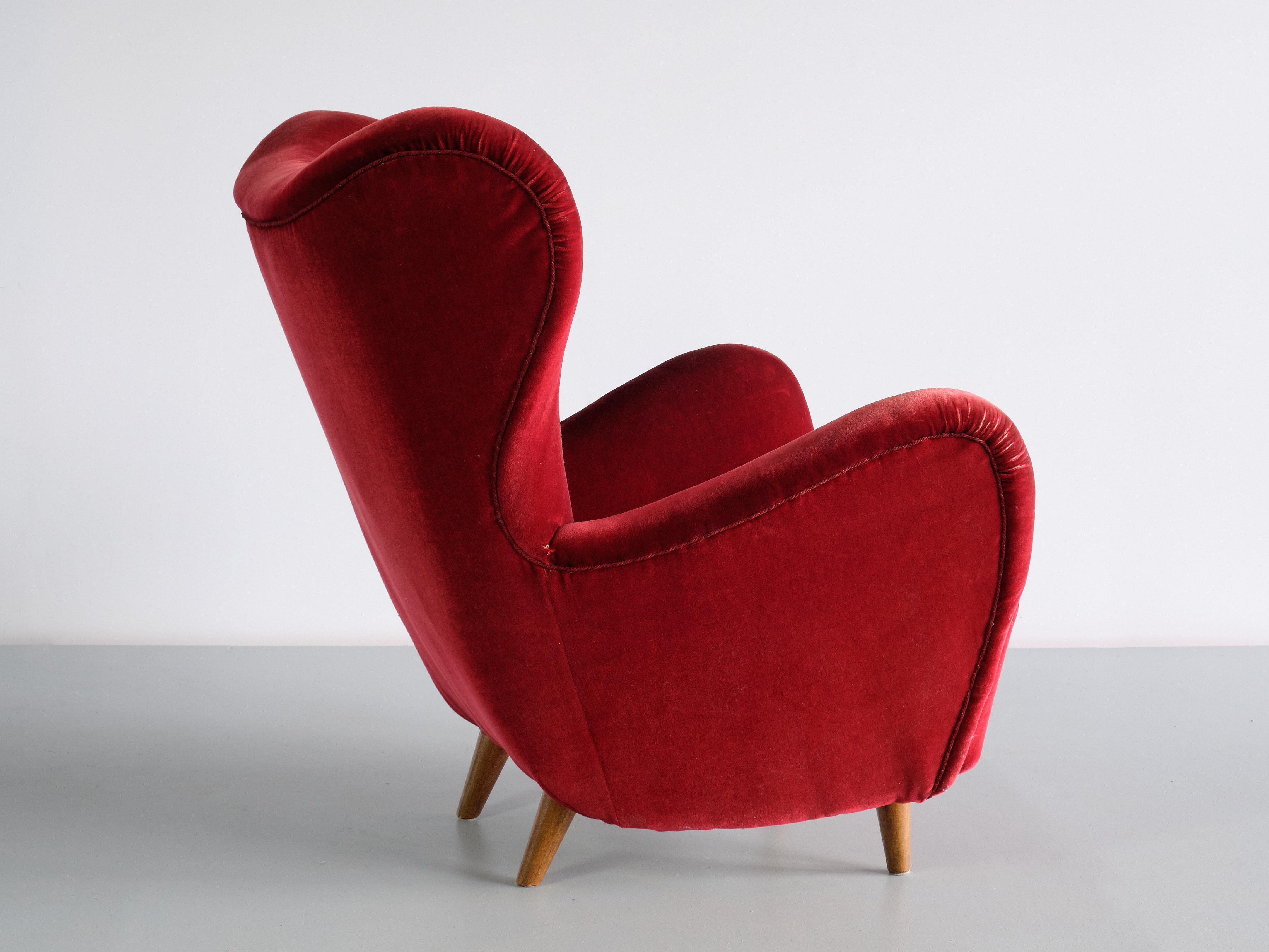Otto Schulz Wingback Chair in Red Velvet and Beech, Boet, Sweden, 1946 In Fair Condition In The Hague, NL