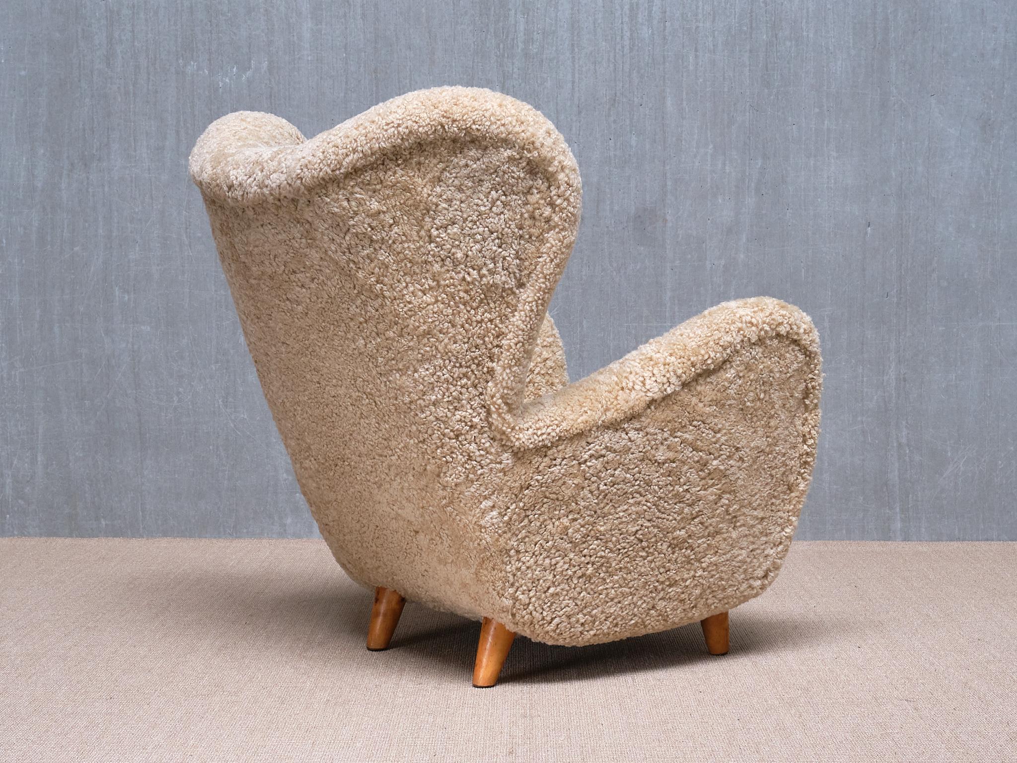 Swedish Otto Schulz Wingback Chair in Sheepskin and Birch, BOET, Sweden, 1946 For Sale