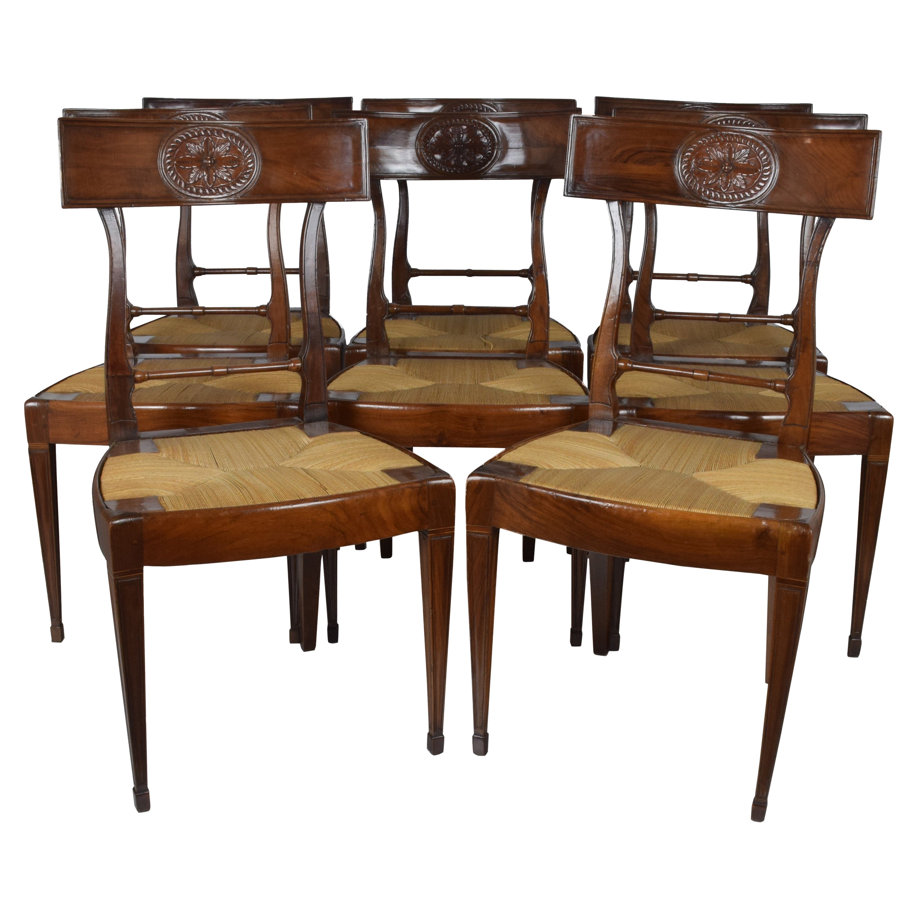 Eight walnut Direttorio chairs, Tuscany, Lucca circa 1795 For Sale