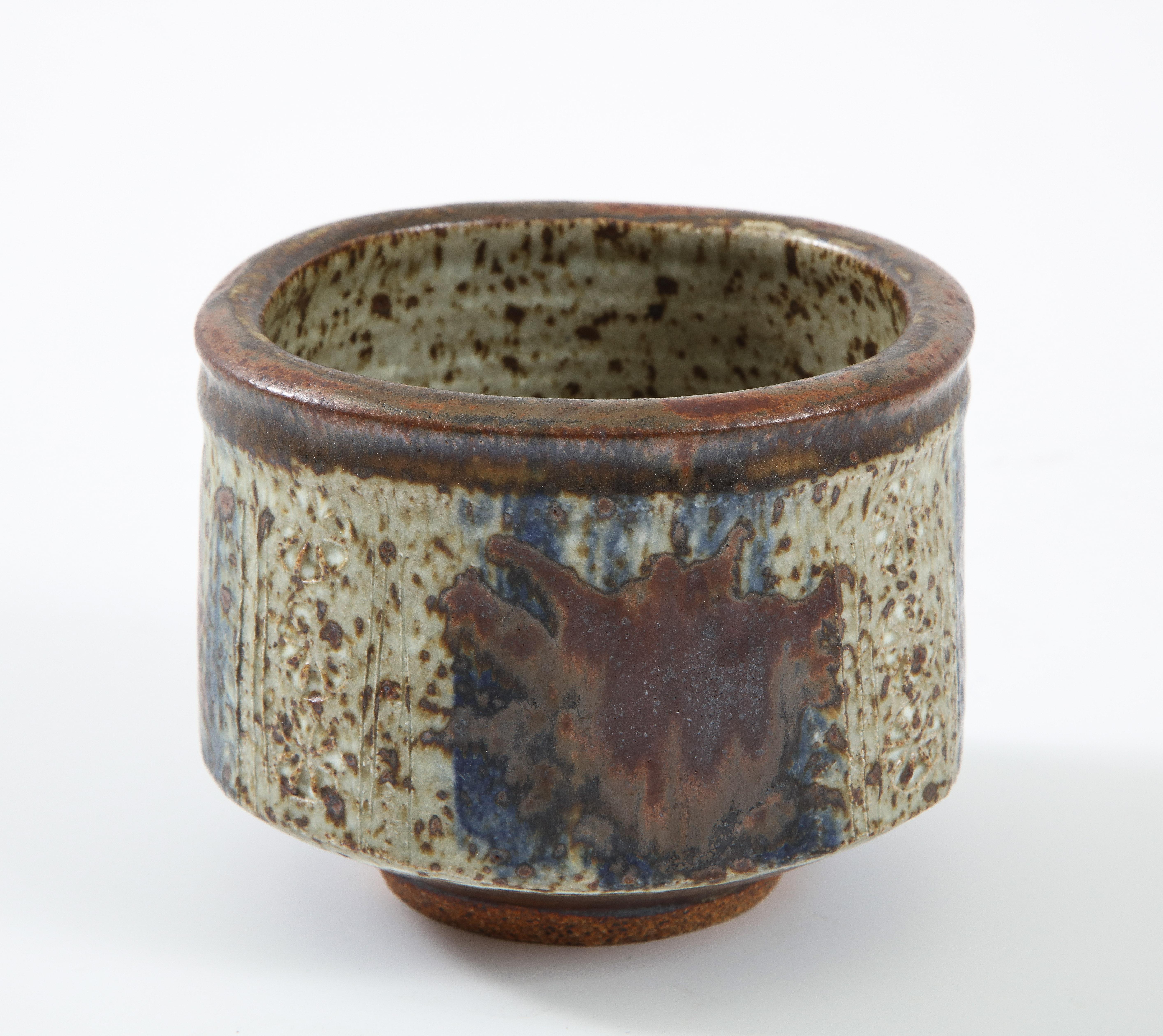 Otto & Vivika Heino stoneware bowl, b. Finland, California Potters, stoneware ceramic vessel, Squircle shape, hand formed with blue and rust colored glazes, signed. California, circa 1970.