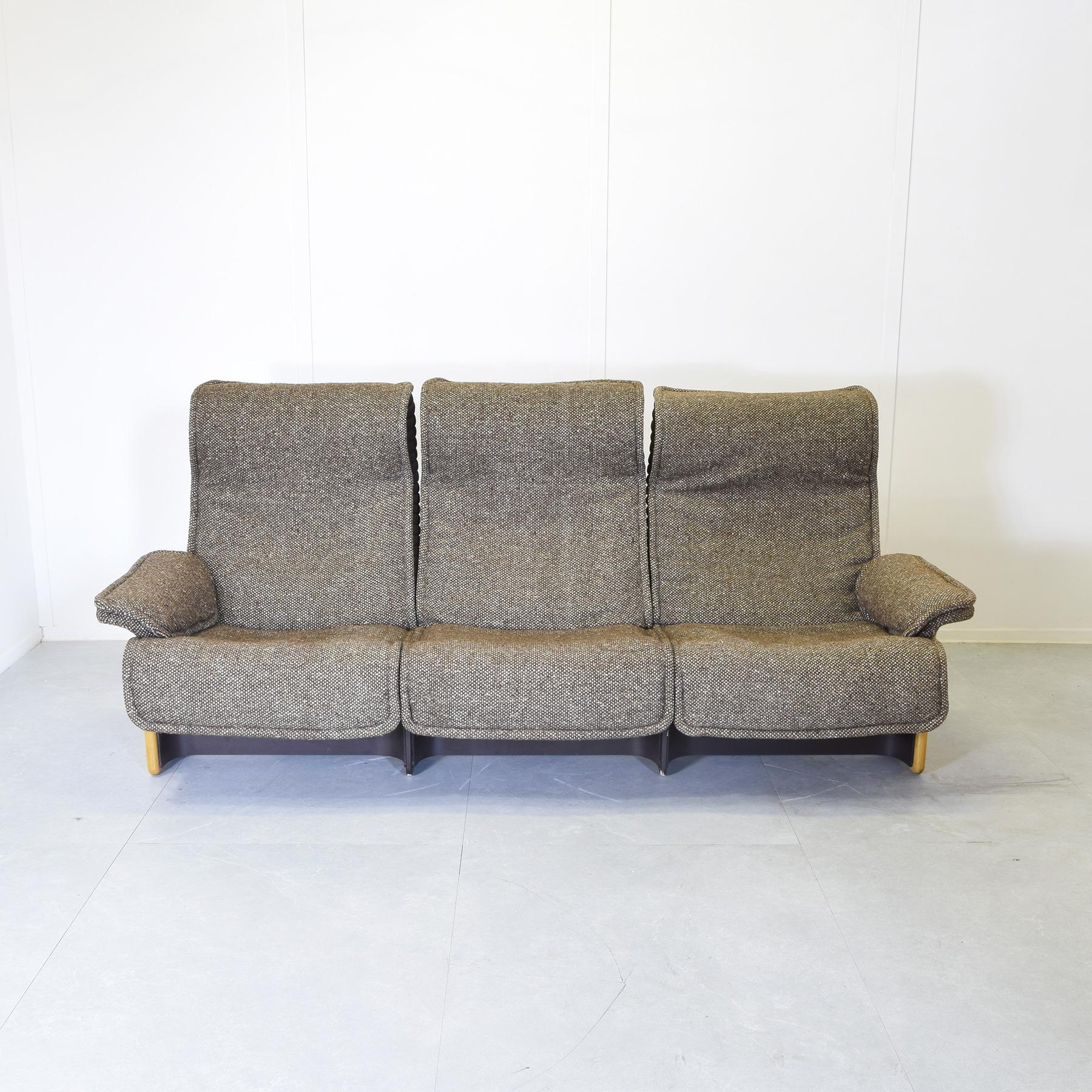 Original comfortable Follow Me two-seater sofa maple wood frame and original fabric seats in good condition, designer Otto Zapf for Koll International 1970s production.

The seat is slightly reclining

Industrial designer Otto Zapf was born into a