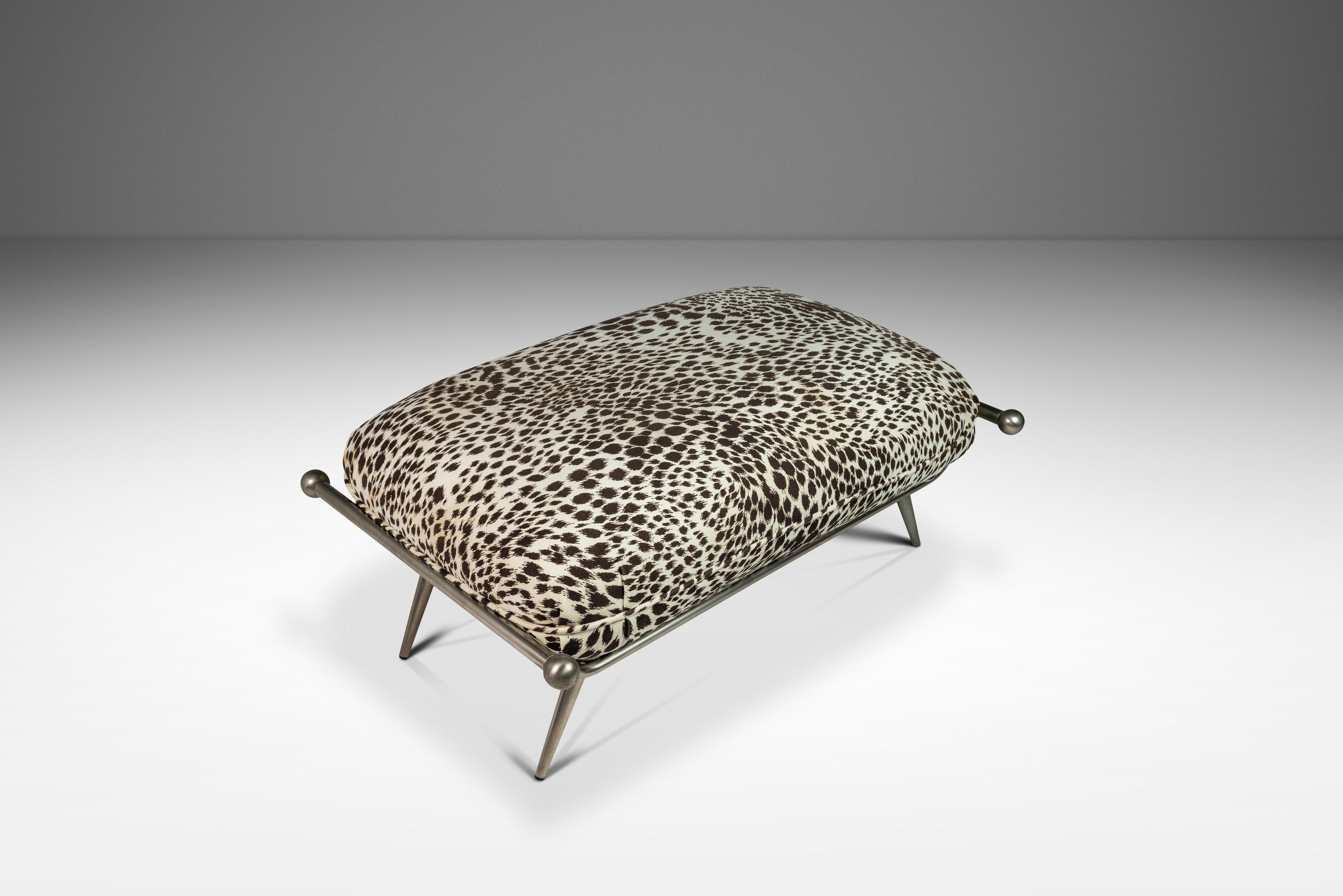 This striking animal print ottoman is a standout piece that effortlessly blends style with functionality. Whether used as a small bench, an entryway bench, or a bedside accent, this vintage piece is perfect for adding flair to any space. Crafted in