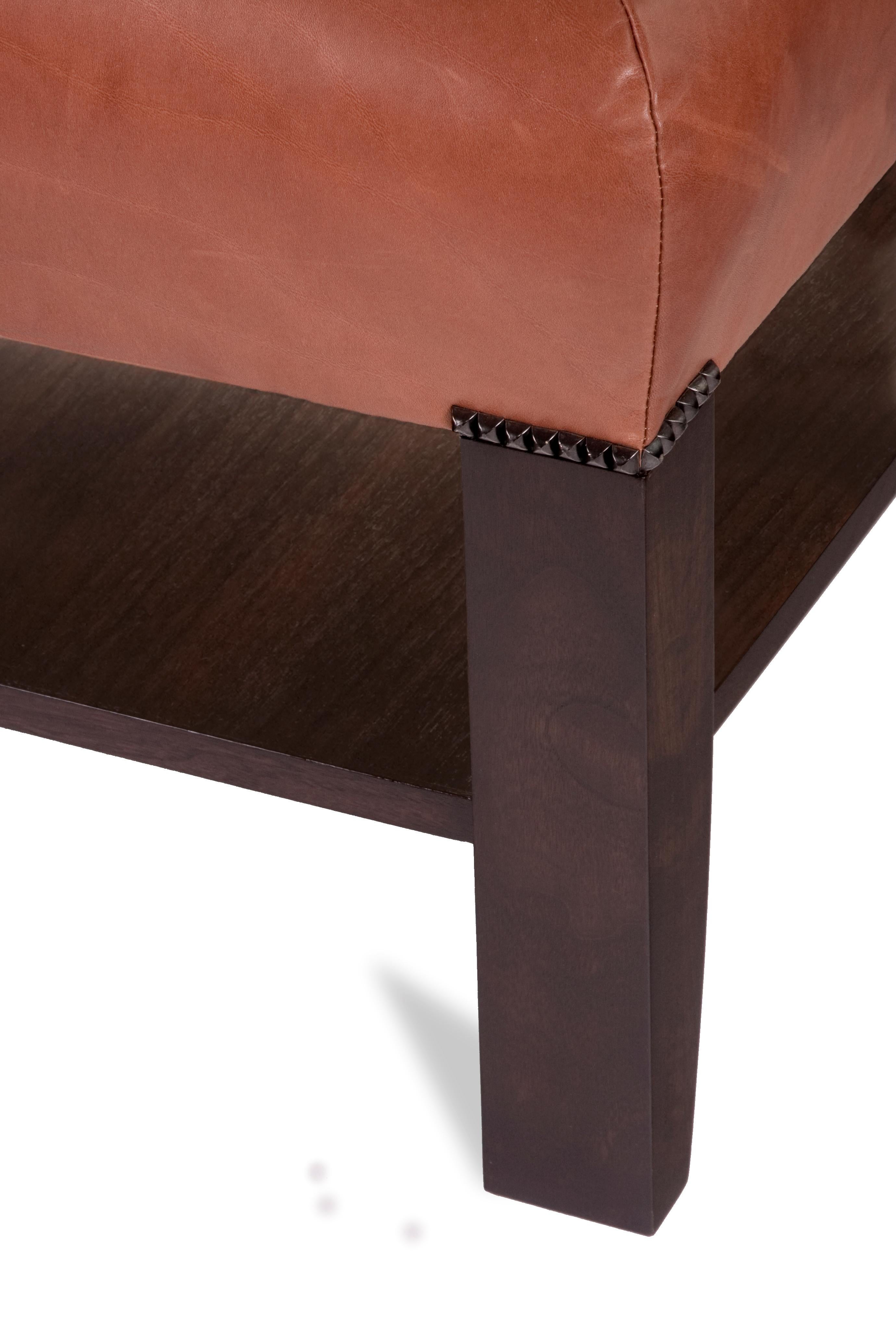 Ottoman /Cocktail Table in Leather and Walnut with Macassar Ebony Inset Tray

The Item shown is in inventory and available now. 
PROMOTION: Complimentary re-upholstering; Customer may provide leather or fabric COM / COL.

